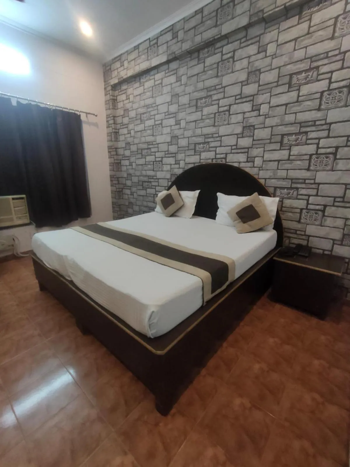 Bed in Mansarover Hotel & Banquets