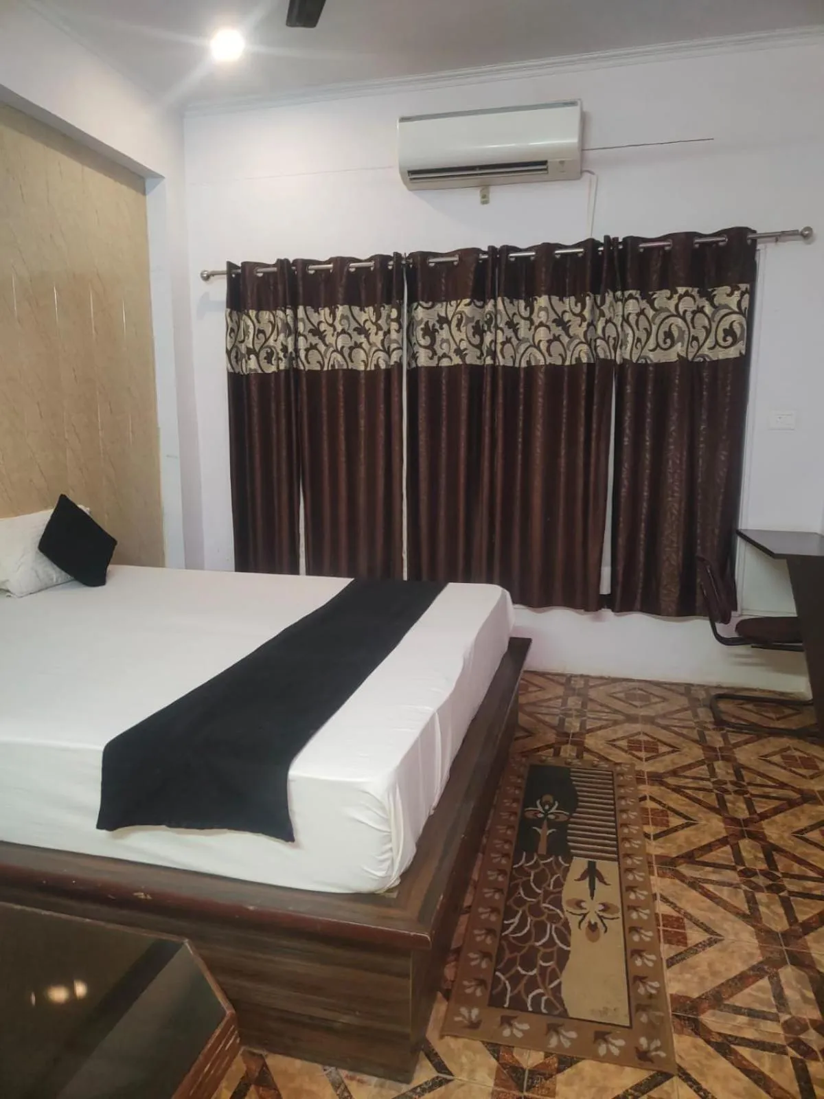 Bed in Mansarover Hotel & Banquets