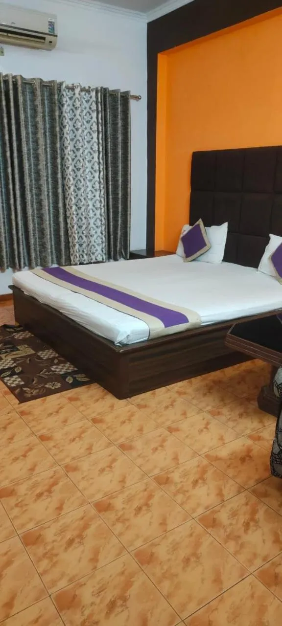 Bed in Mansarover Hotel & Banquets