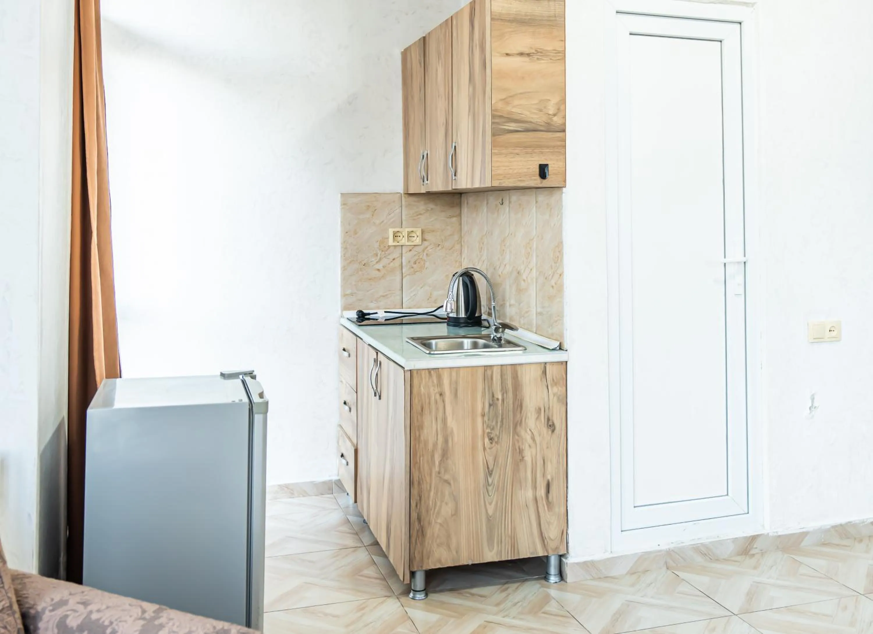 Kitchen or kitchenette in Batumi Inn Hotel