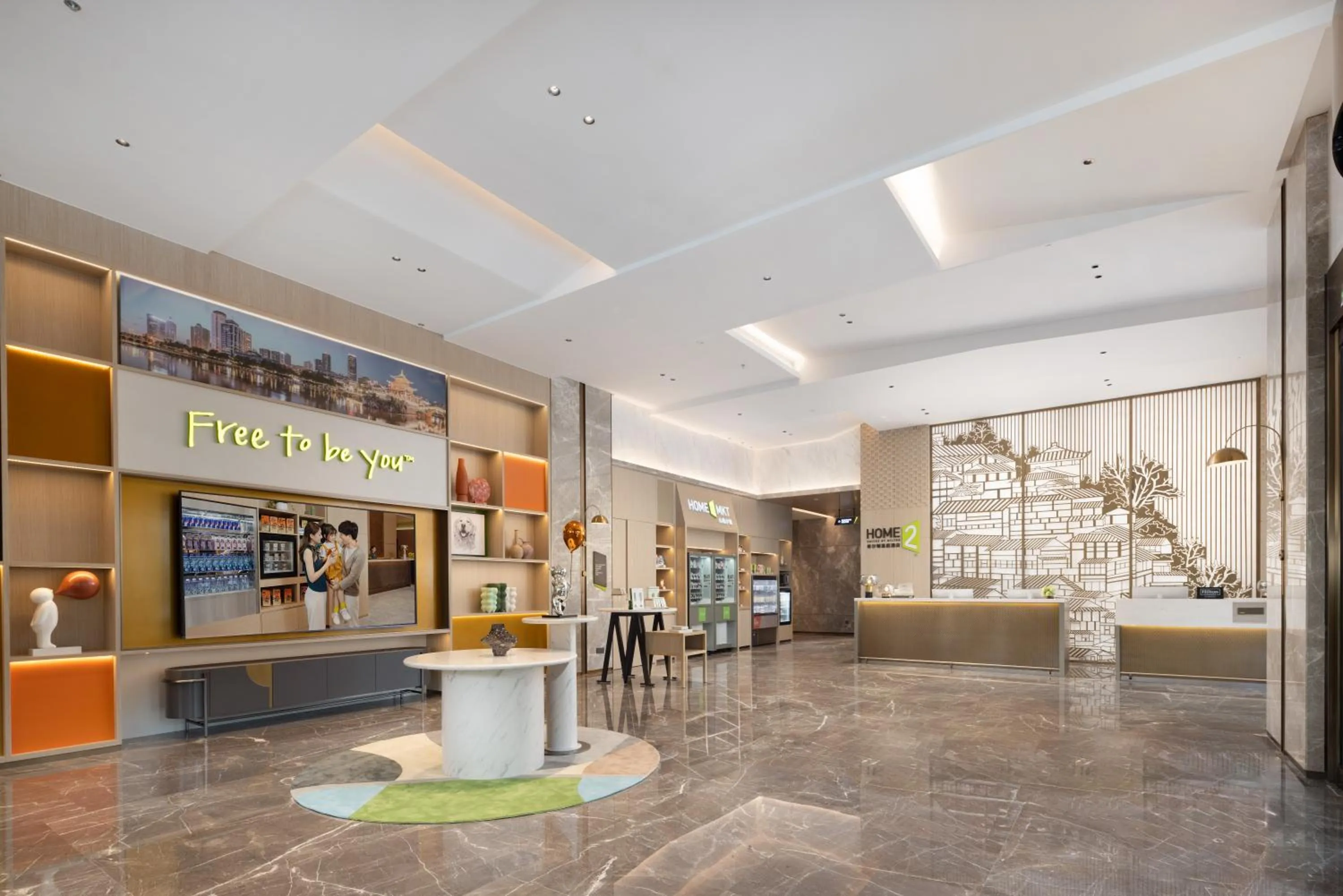 Property logo or sign in Home2 Suite by Hilton Guiyang Nanming Jiaxiu