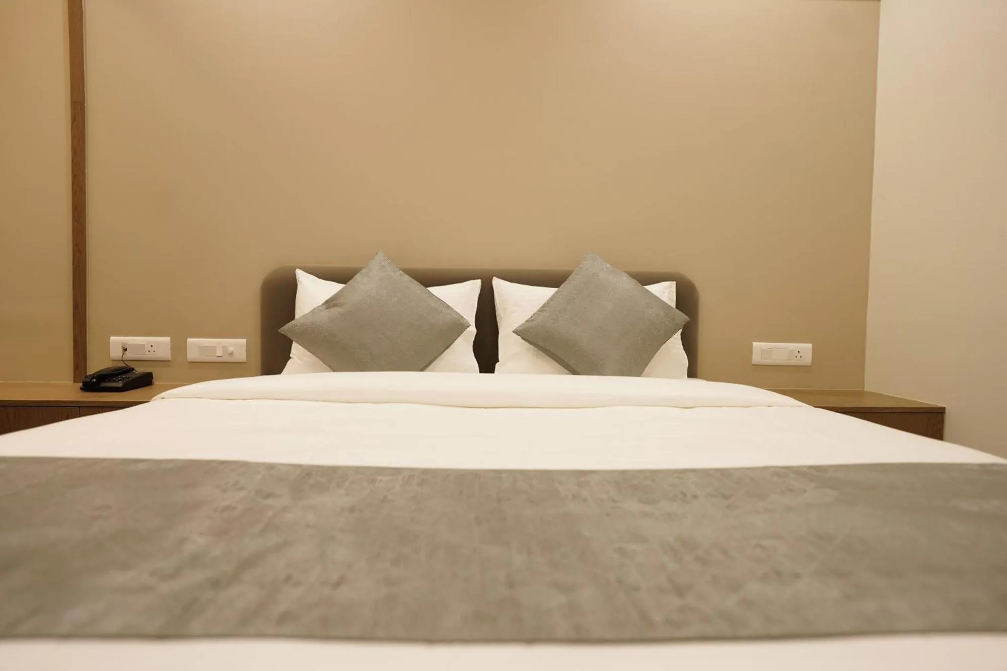 Bed in A Square Executive Hotel