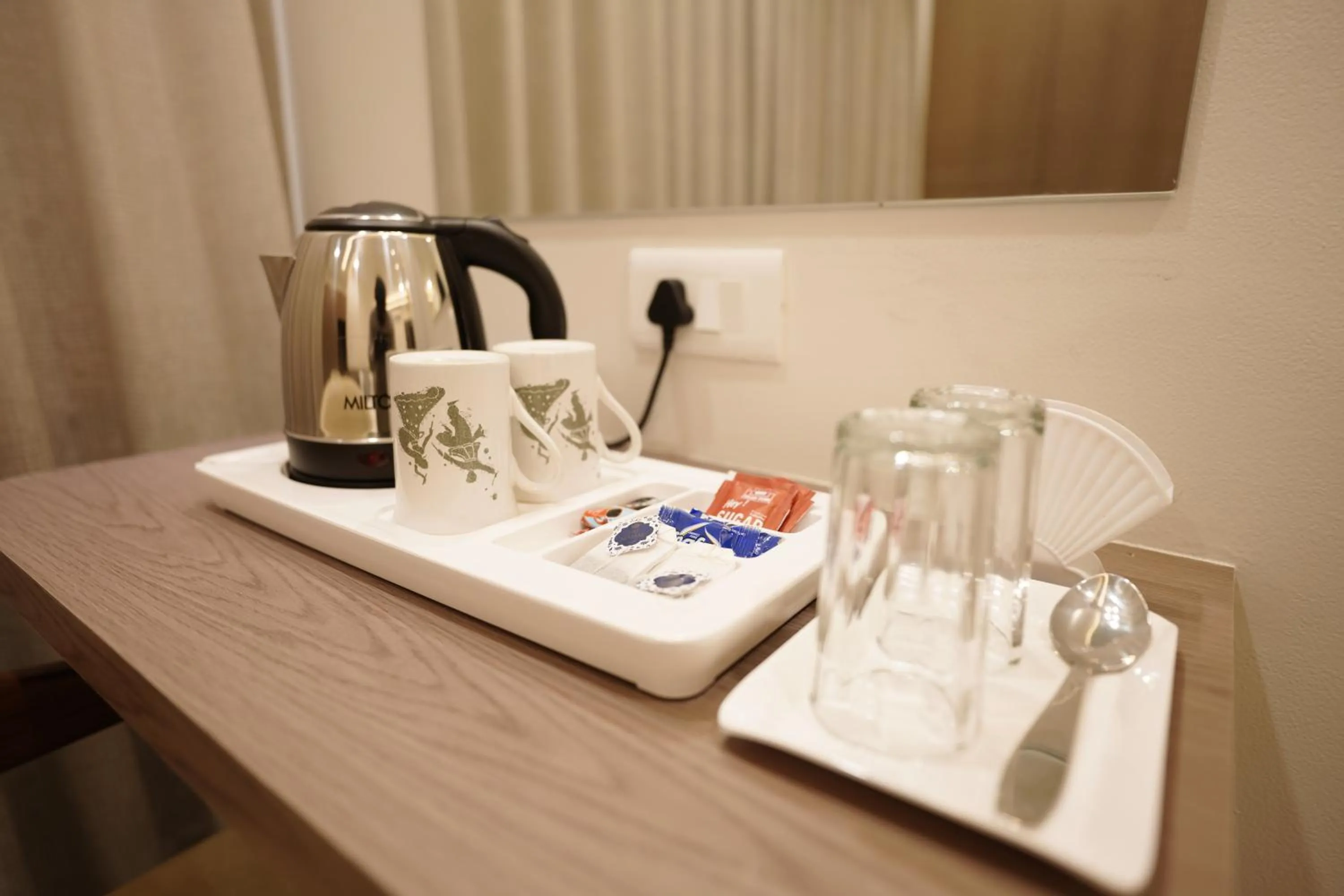 Coffee/tea facilities in A Square Executive Hotel