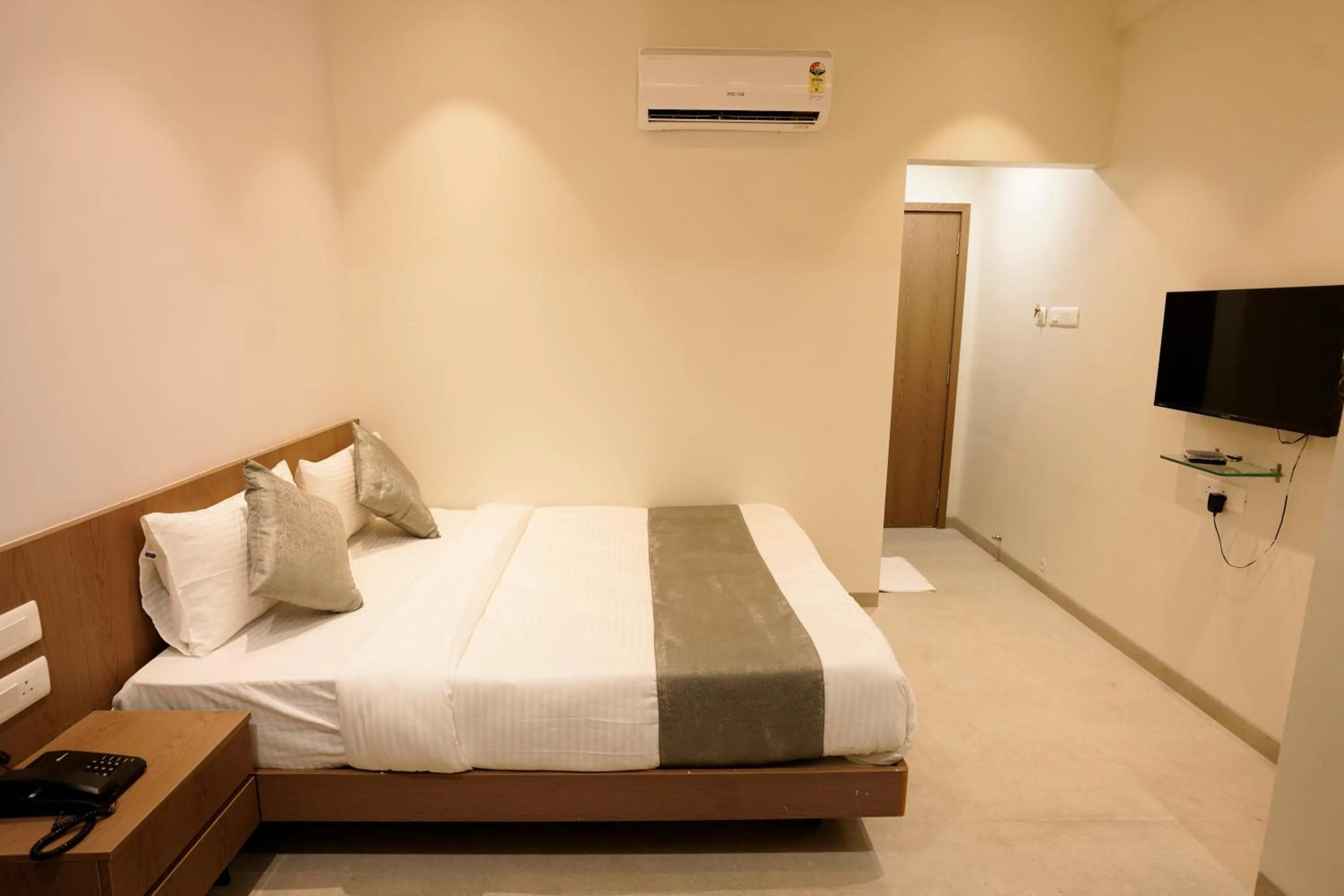 Bed in A Square Executive Hotel