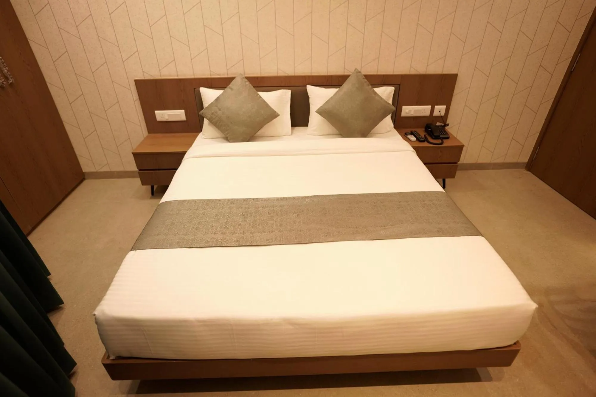 Bed in A Square Executive Hotel
