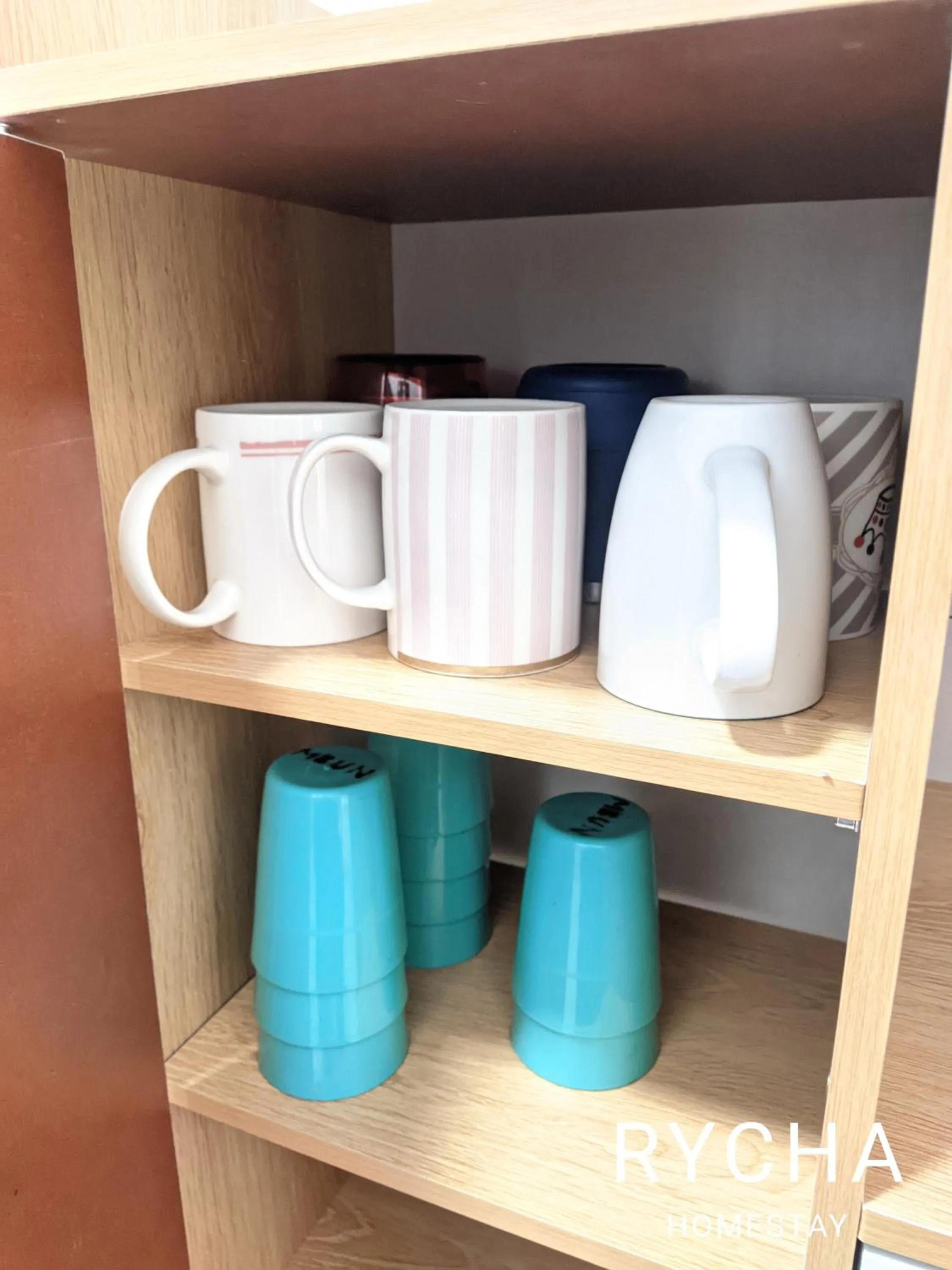 Kitchen or kitchenette in Rycha Homestay A famosa near Waterpark