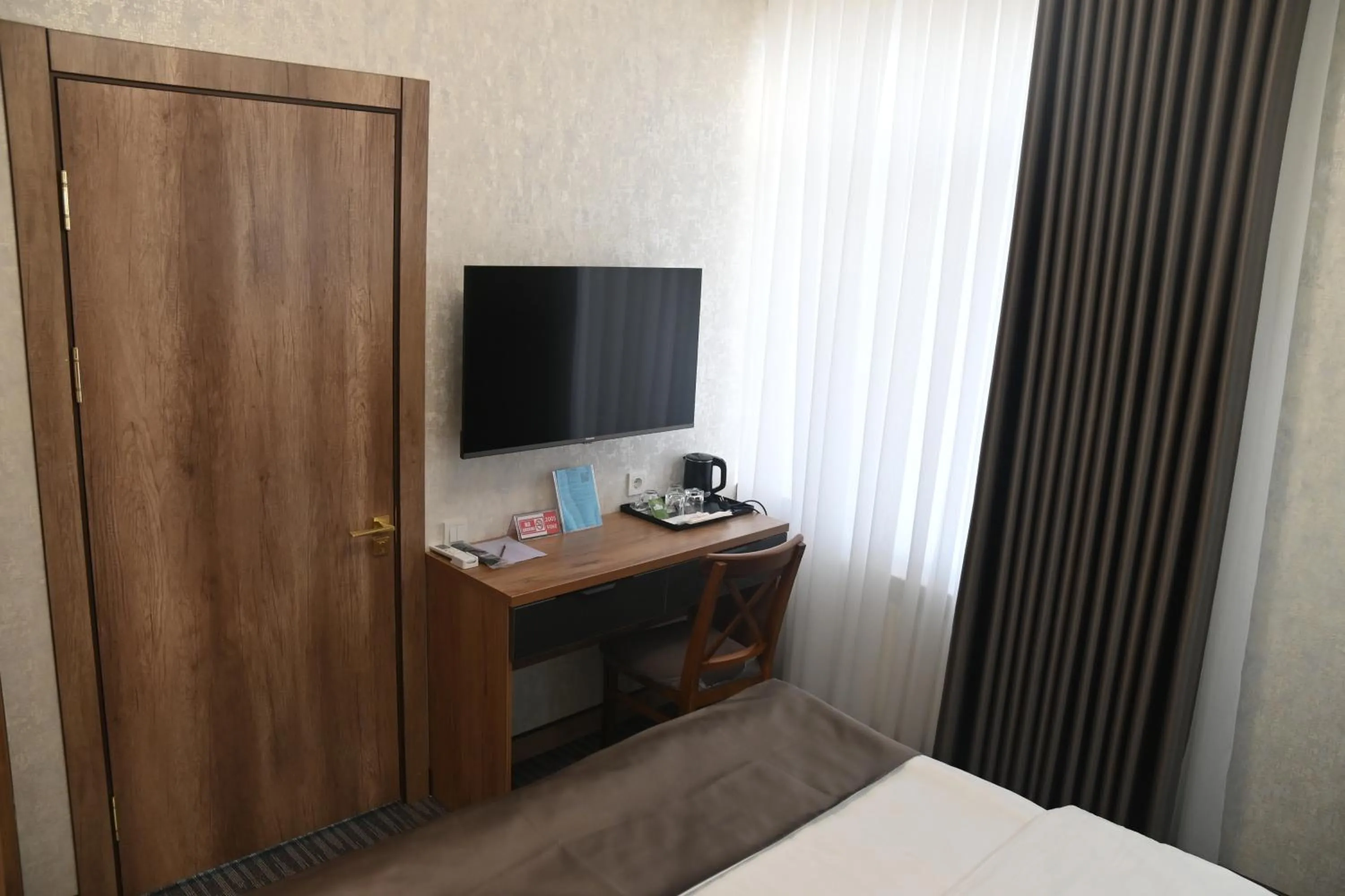 Bed in My Status Hotel