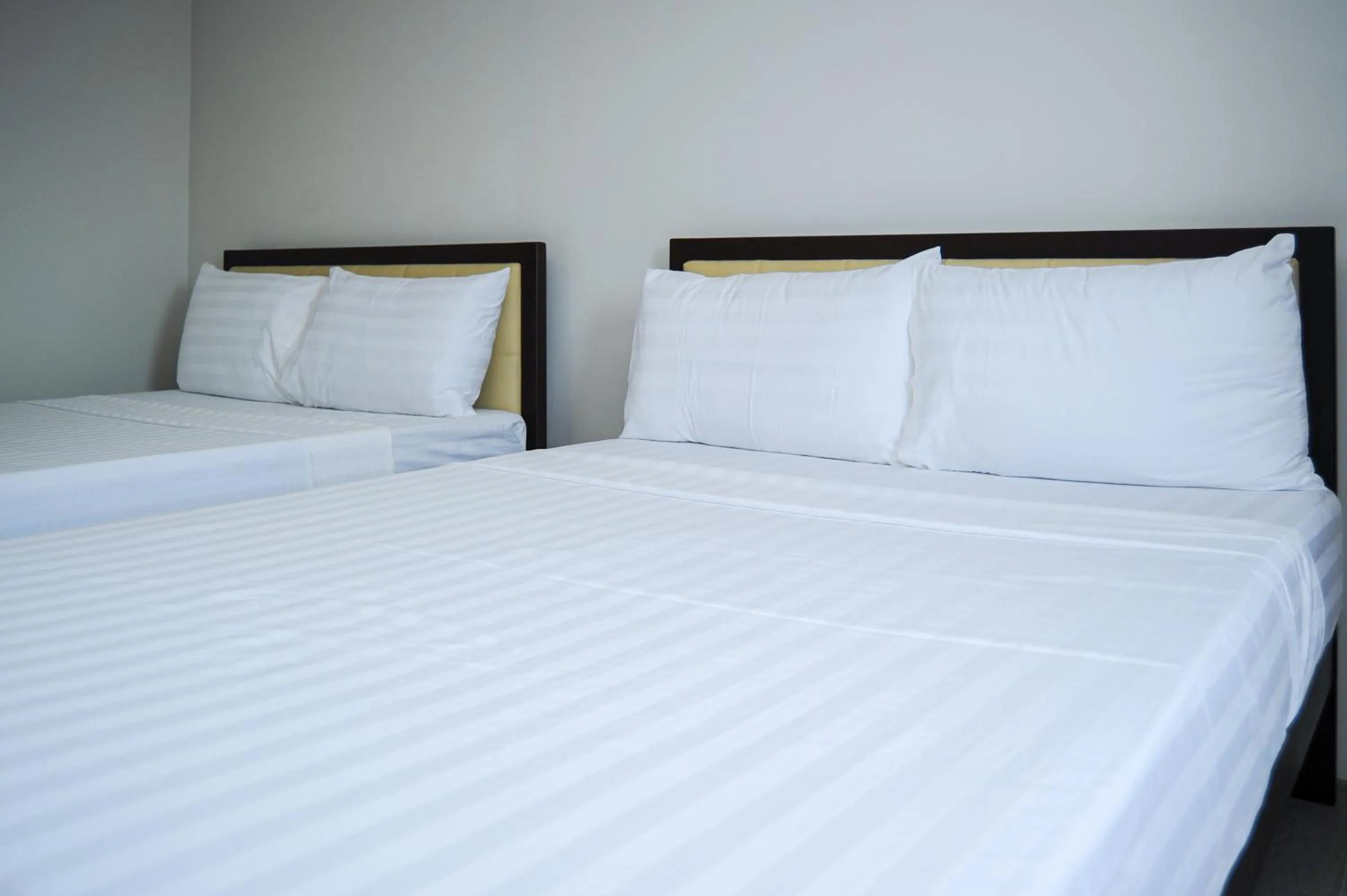 Bed in Kaia Isabelle Hotel Puerto Princesa