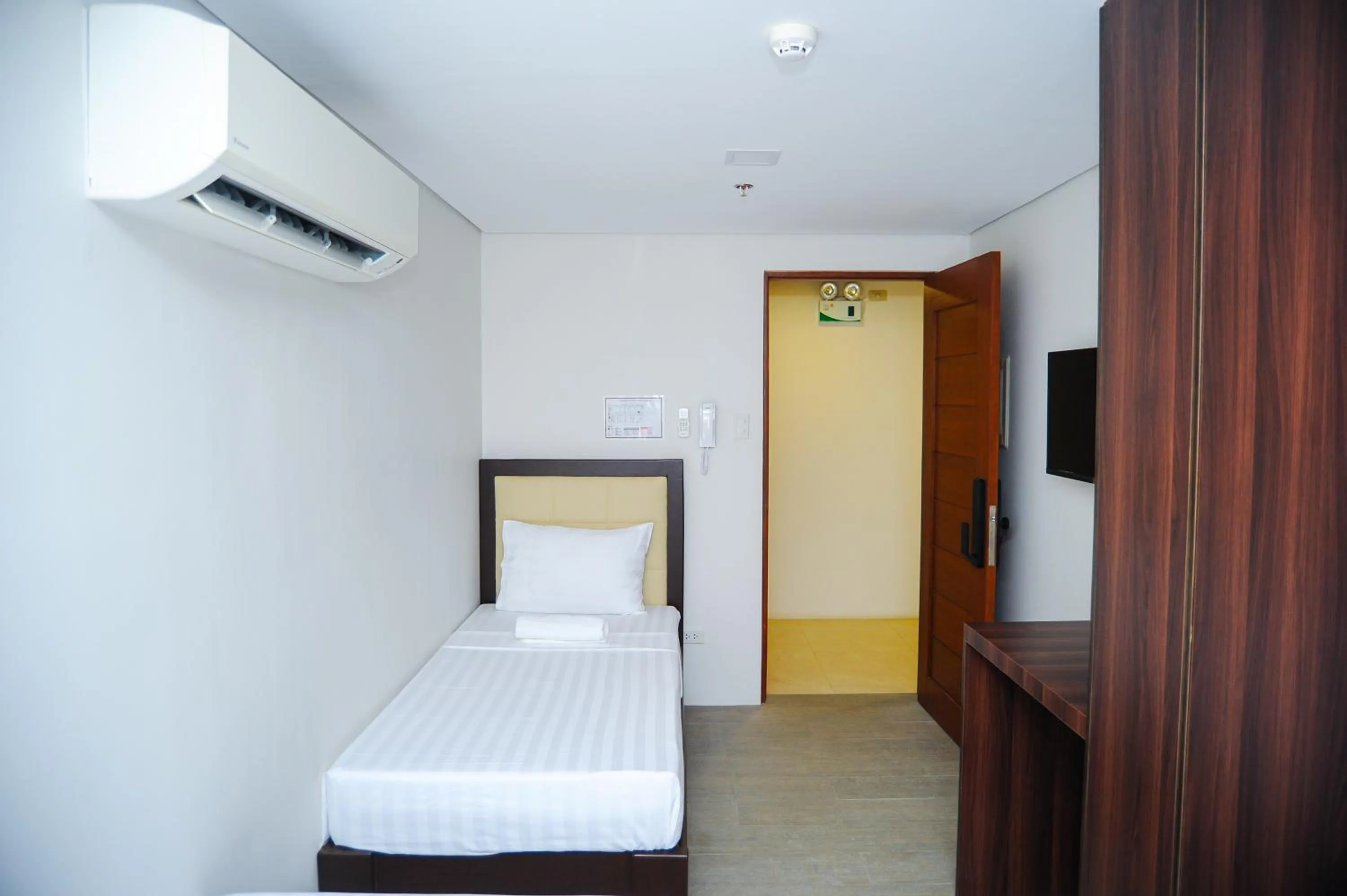 Bed in Kaia Isabelle Hotel Puerto Princesa