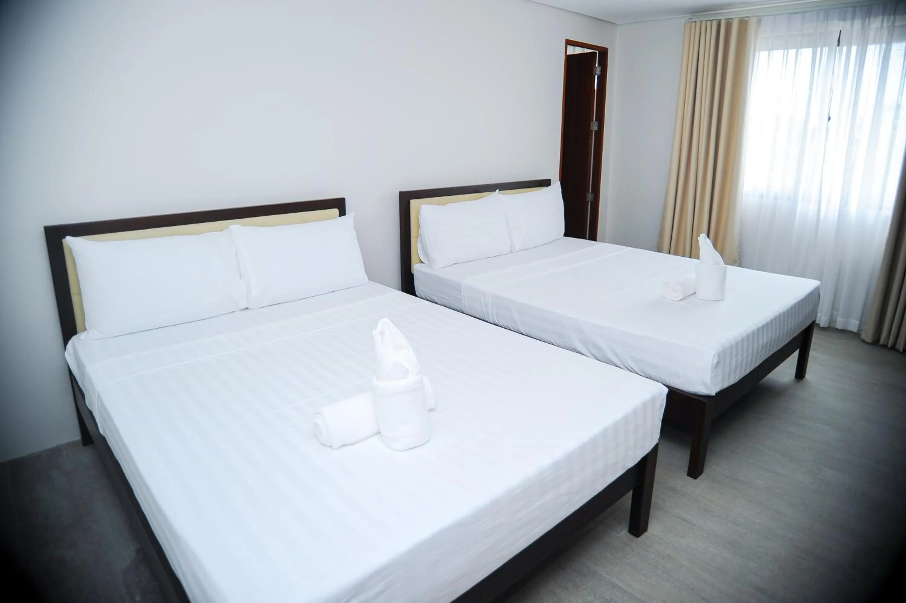 Bed in Kaia Isabelle Hotel Puerto Princesa