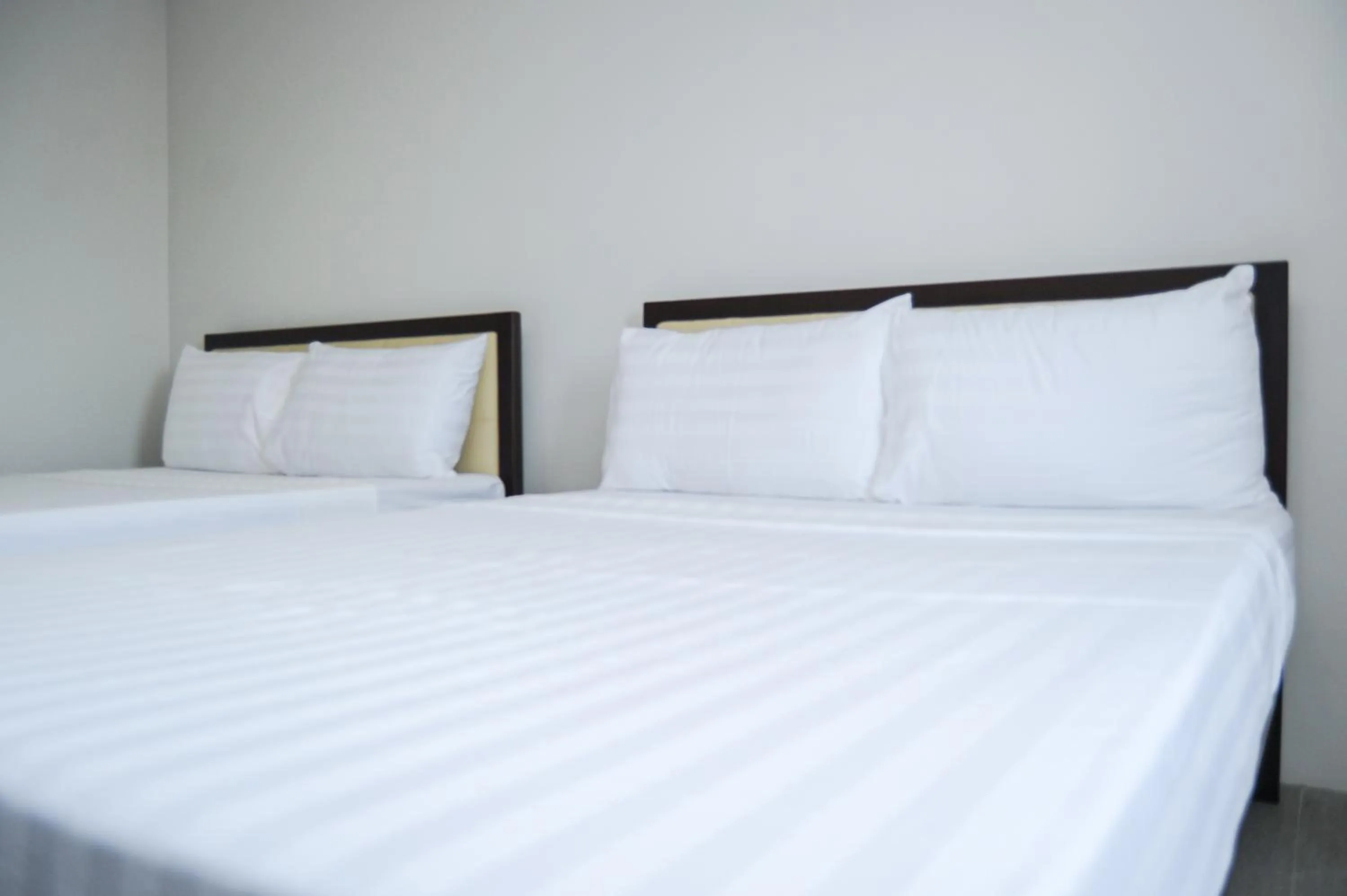 Bed in Kaia Isabelle Hotel Puerto Princesa