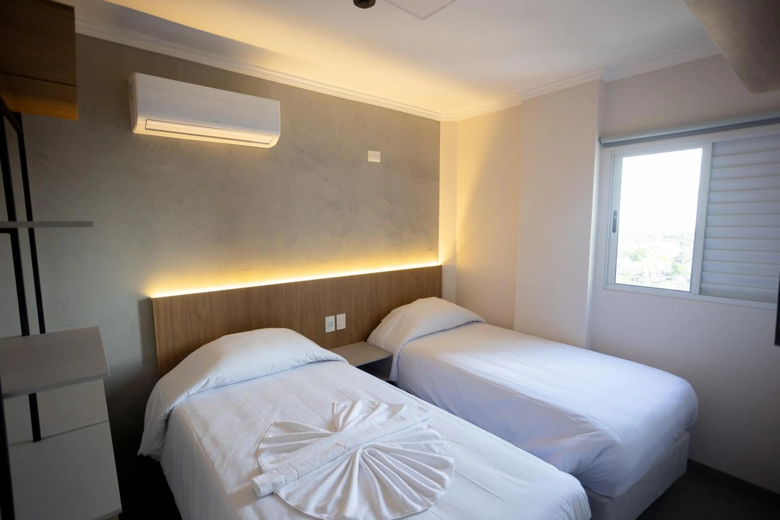 Bed in Terraço Flat Hotel