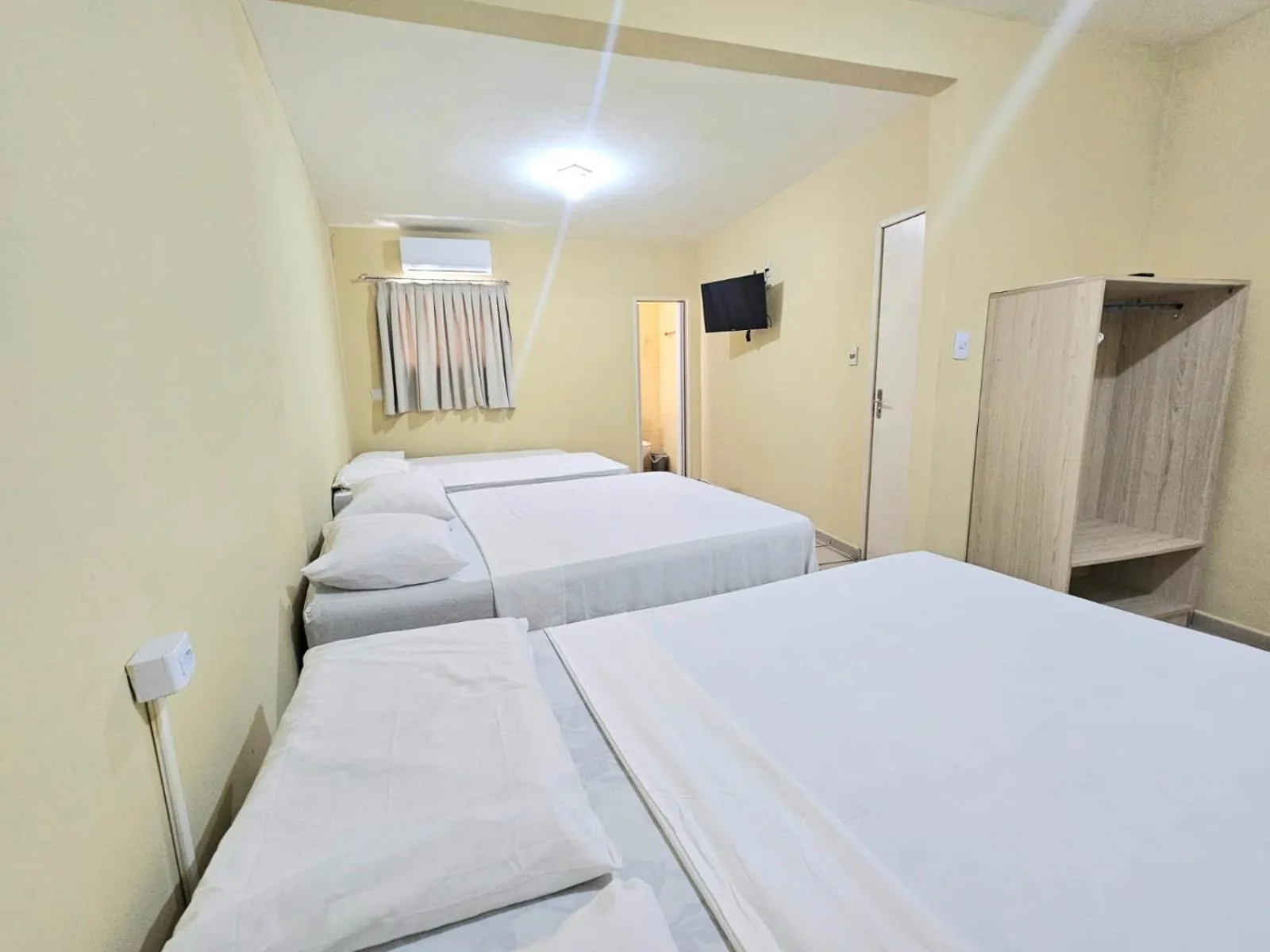 Bed in Pousada Estrela Dourada