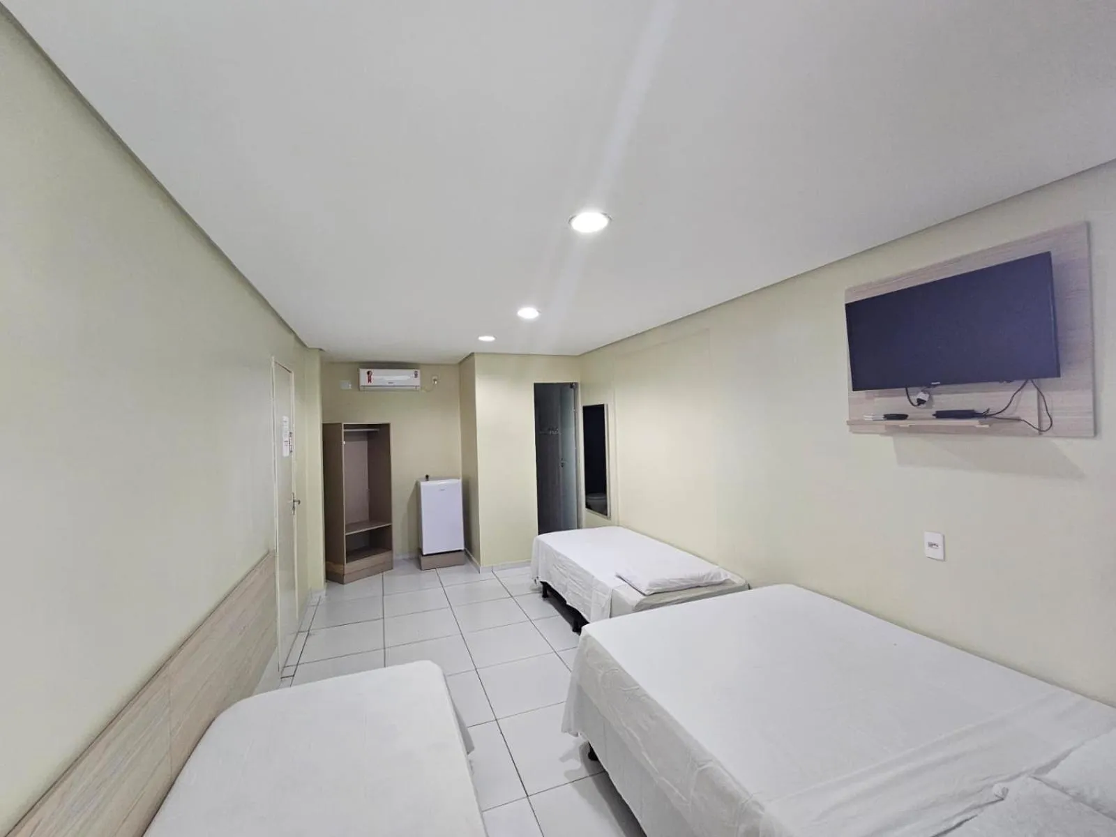 Bed in Pousada Estrela Dourada