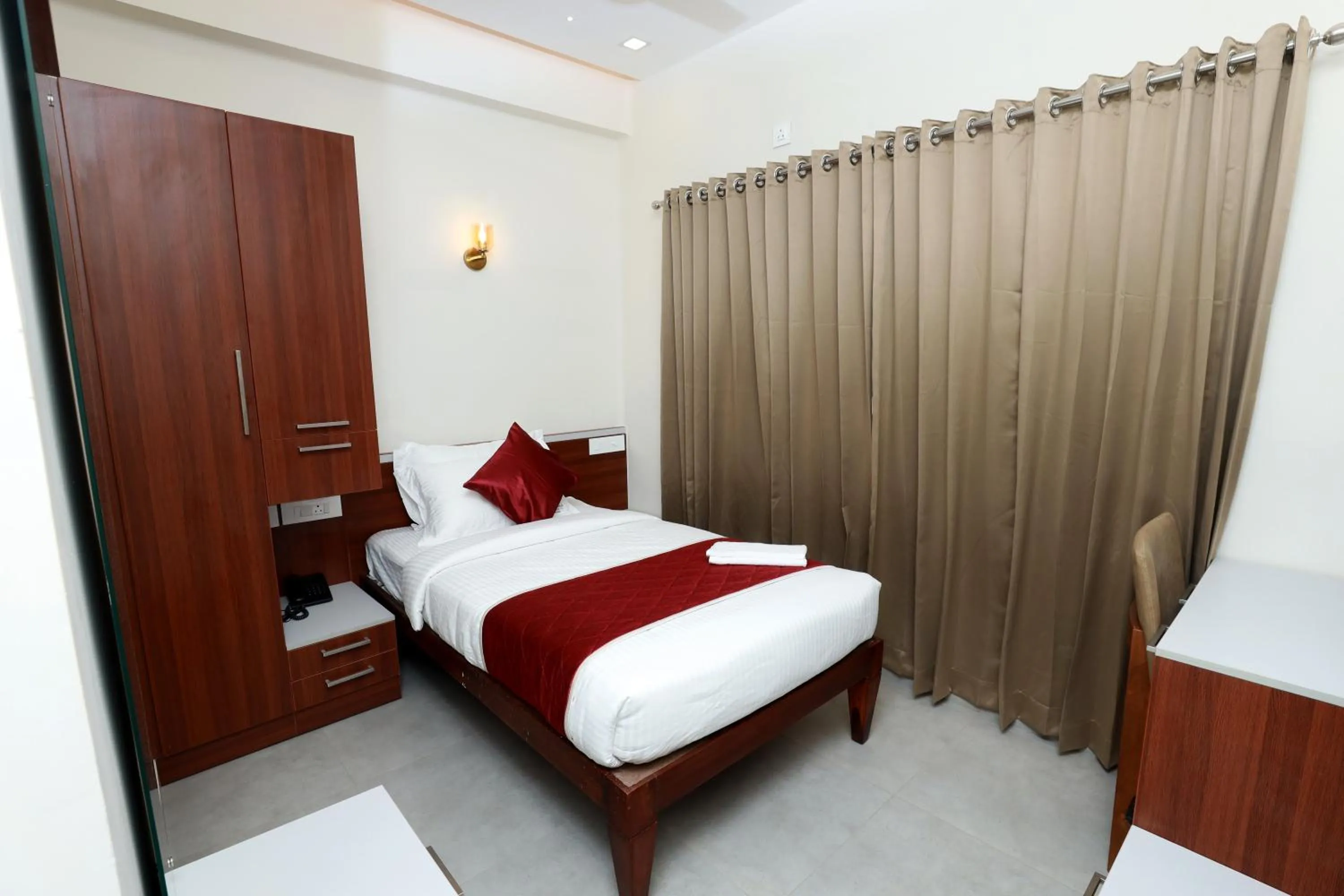 Photo of the whole room, Bed in K Grandeur Hotels