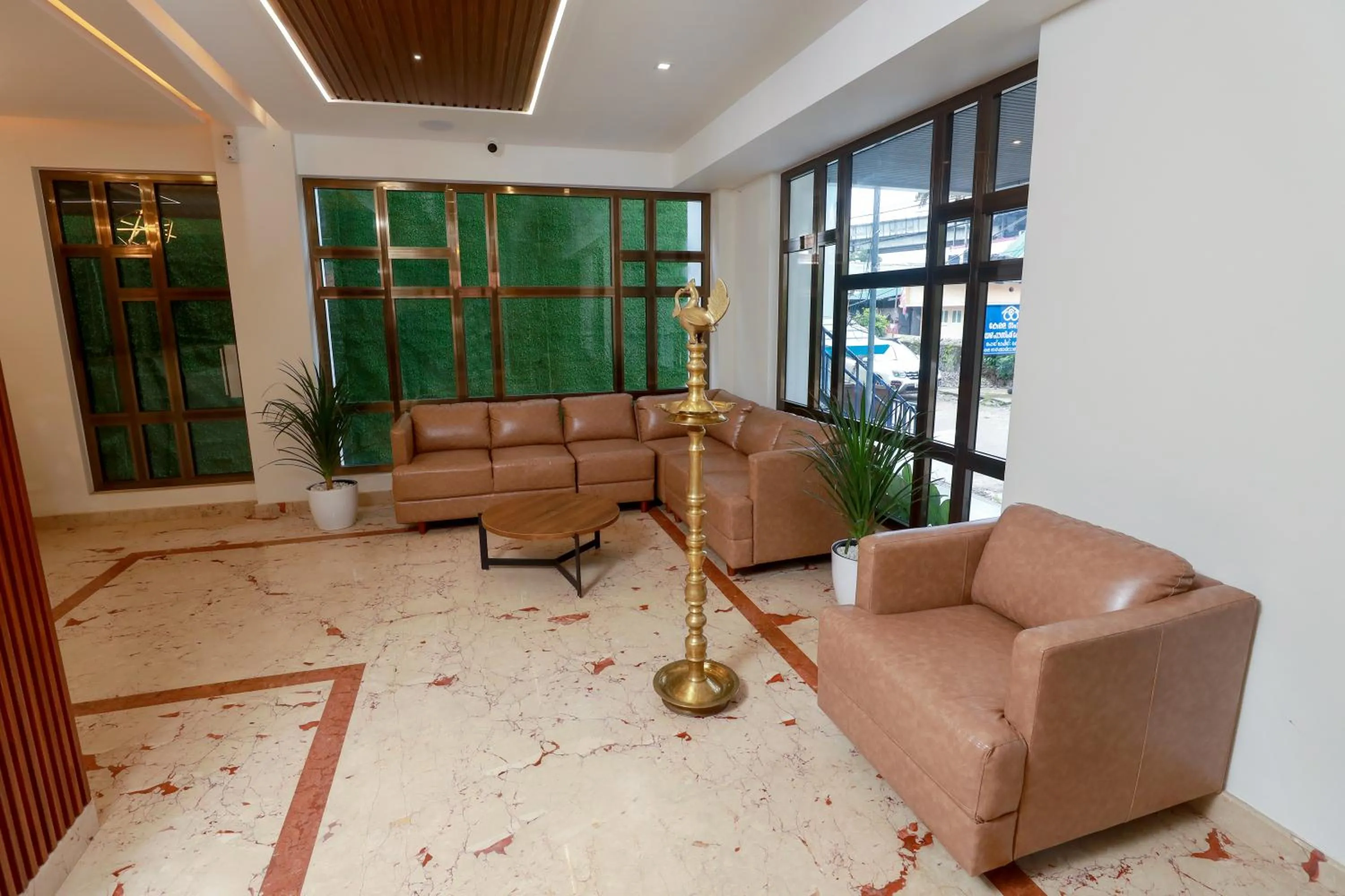 Communal lounge/ TV room in K Grandeur Hotels