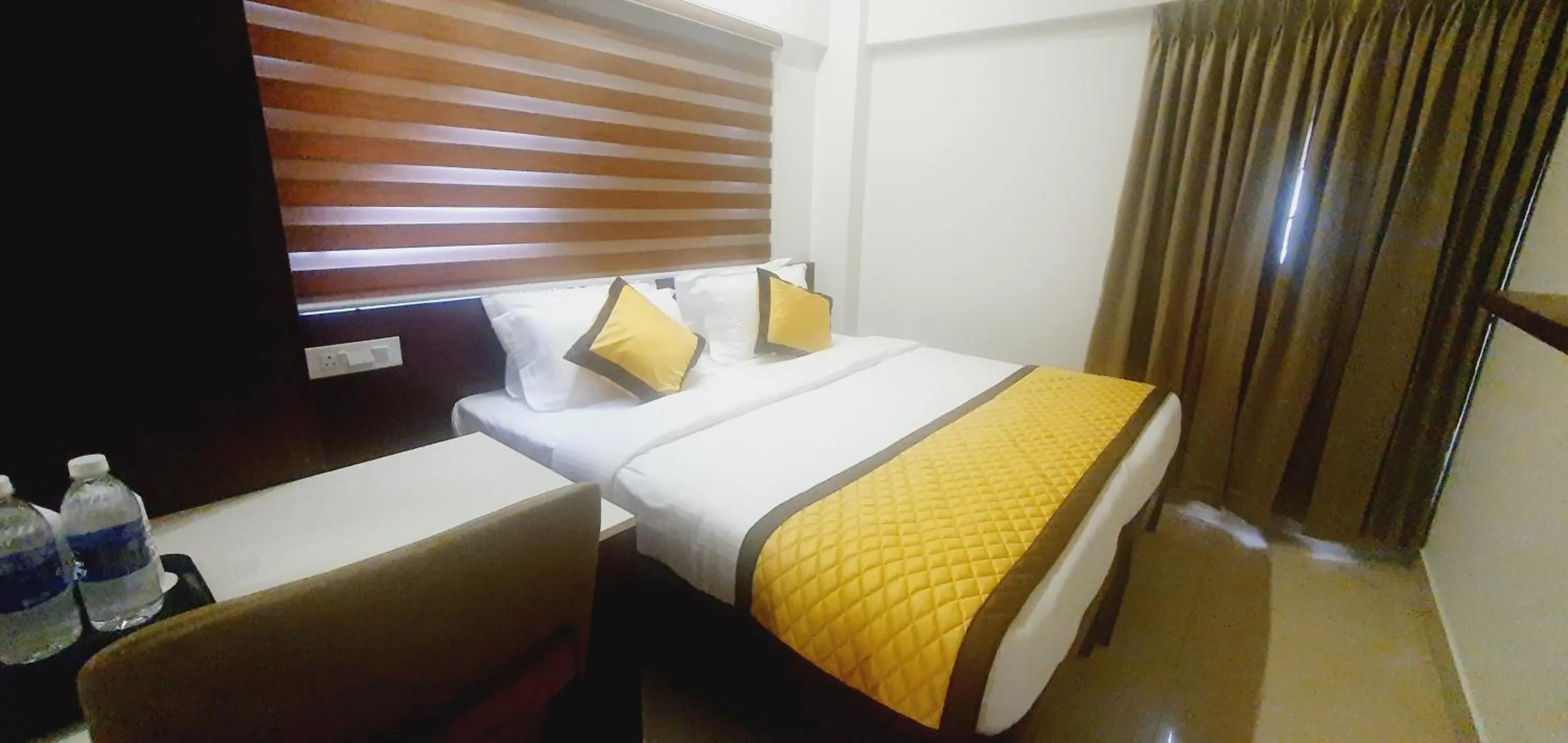 Bed in K Grandeur Hotels