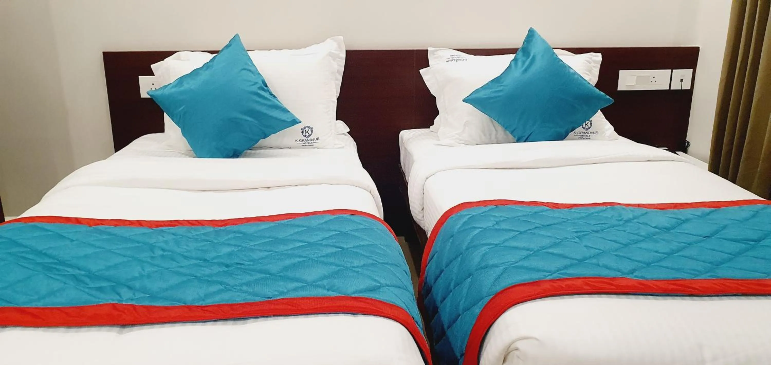 Bed in K Grandeur Hotels