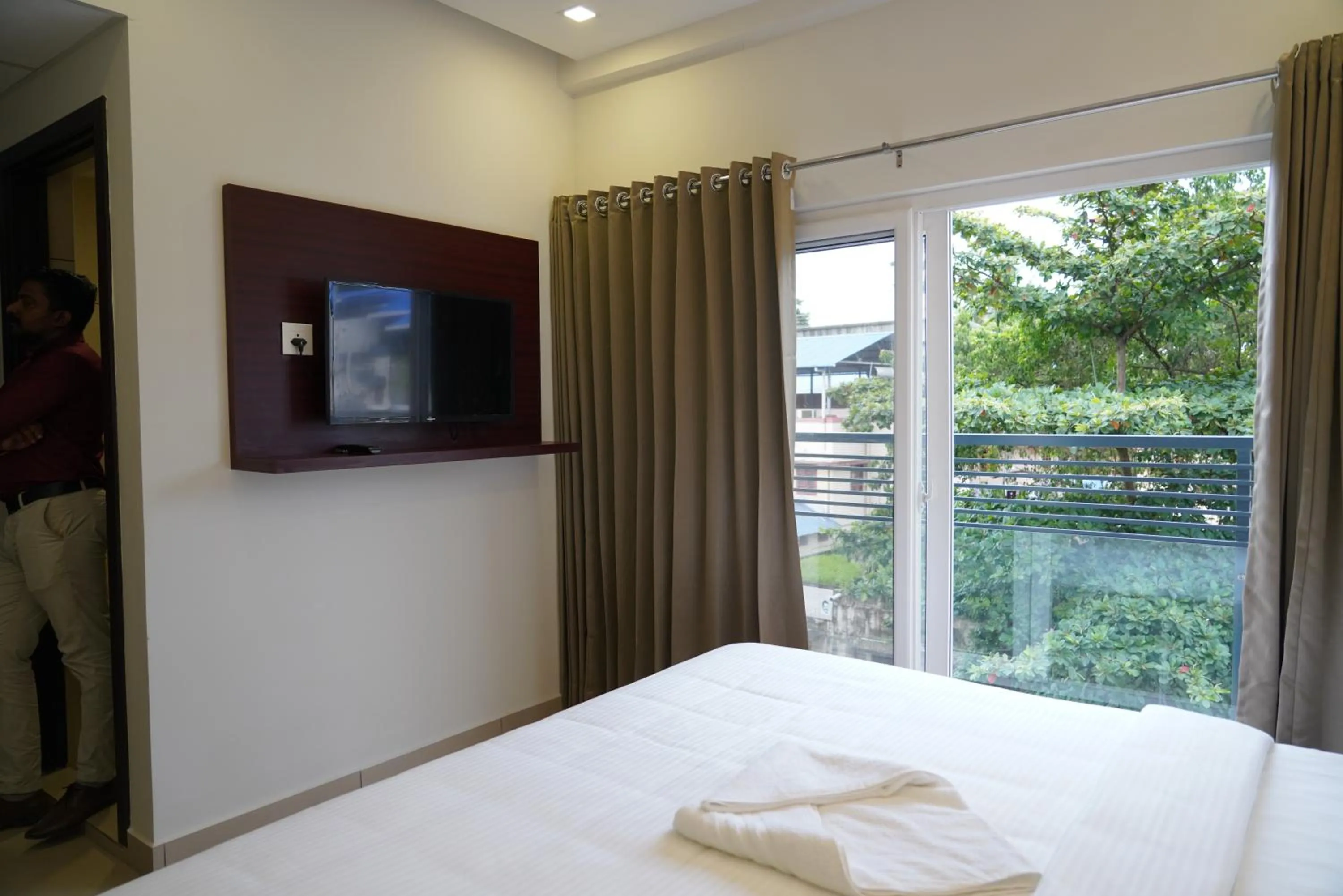 View (from property/room), Bed in K Grandeur Hotels