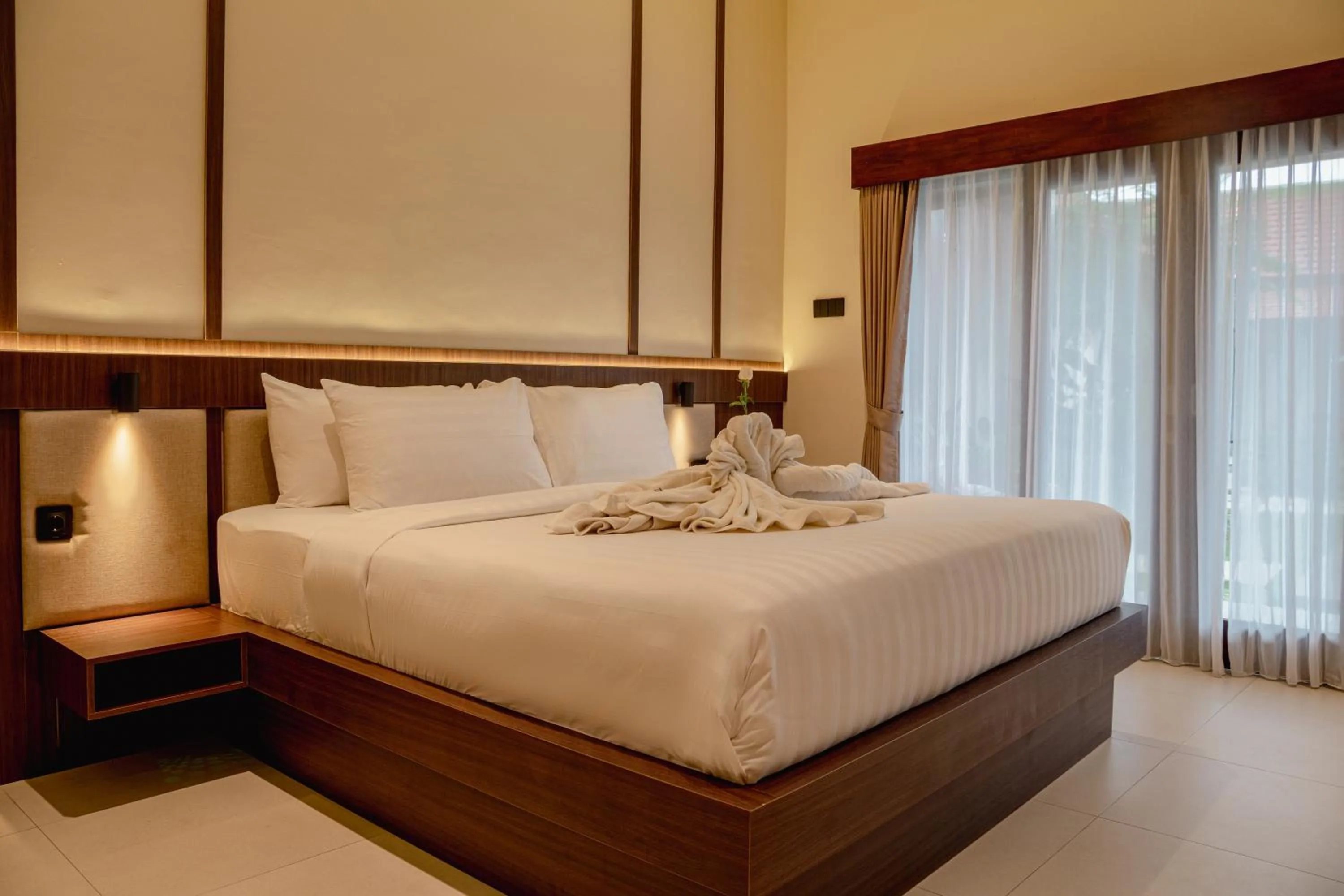 Bed in Tut Winten a Tranquil Living Villa Ubud