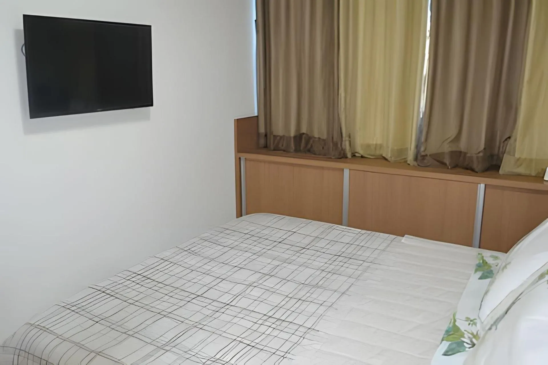 Bed in Nui Supreme Beach Living