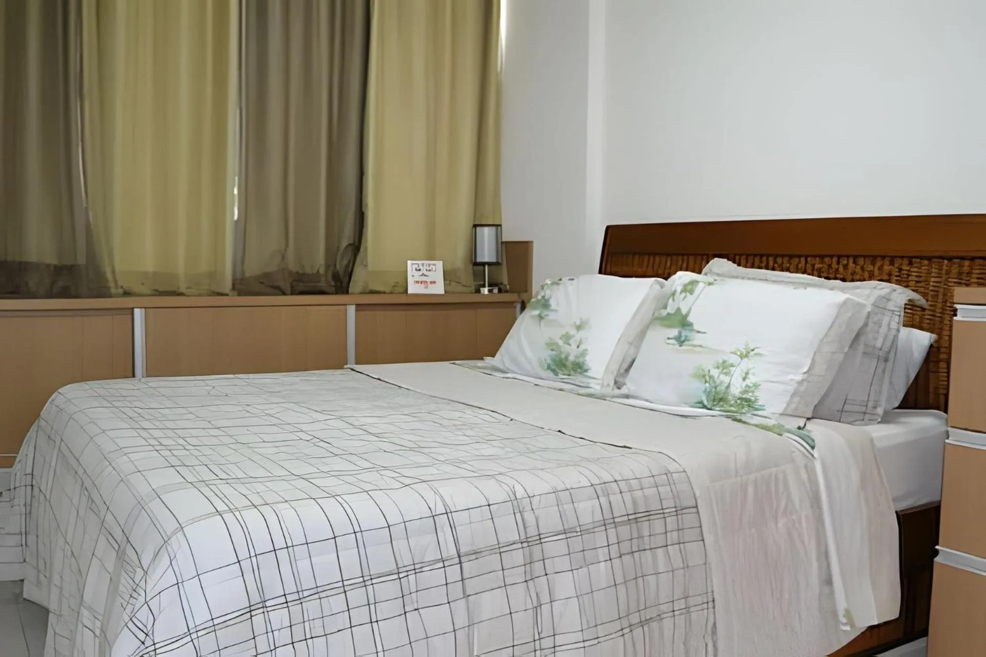 Bed in Nui Supreme Beach Living