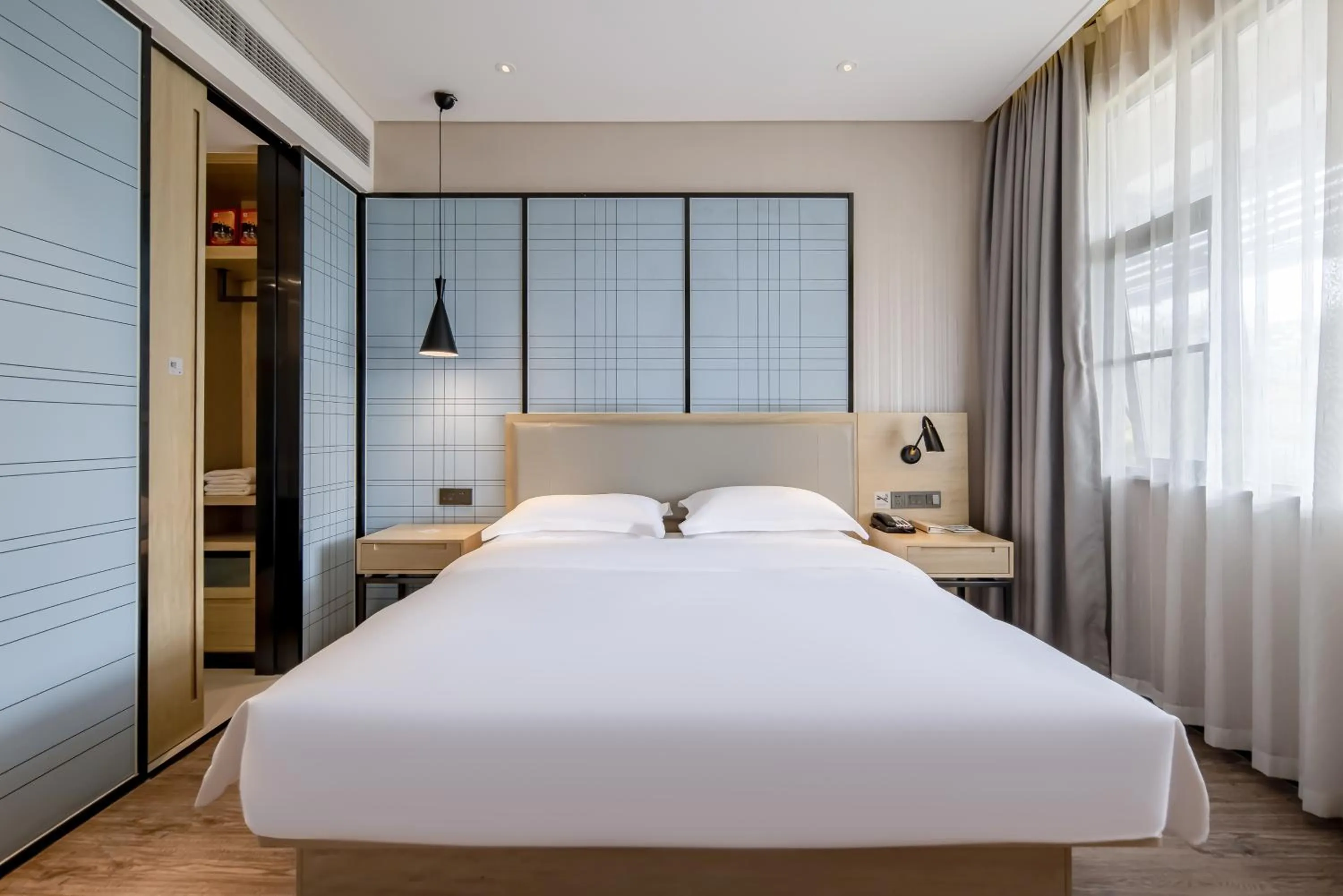 Bed in Echarm Hotel Nanning the MixC Exhibition Center Metro Station