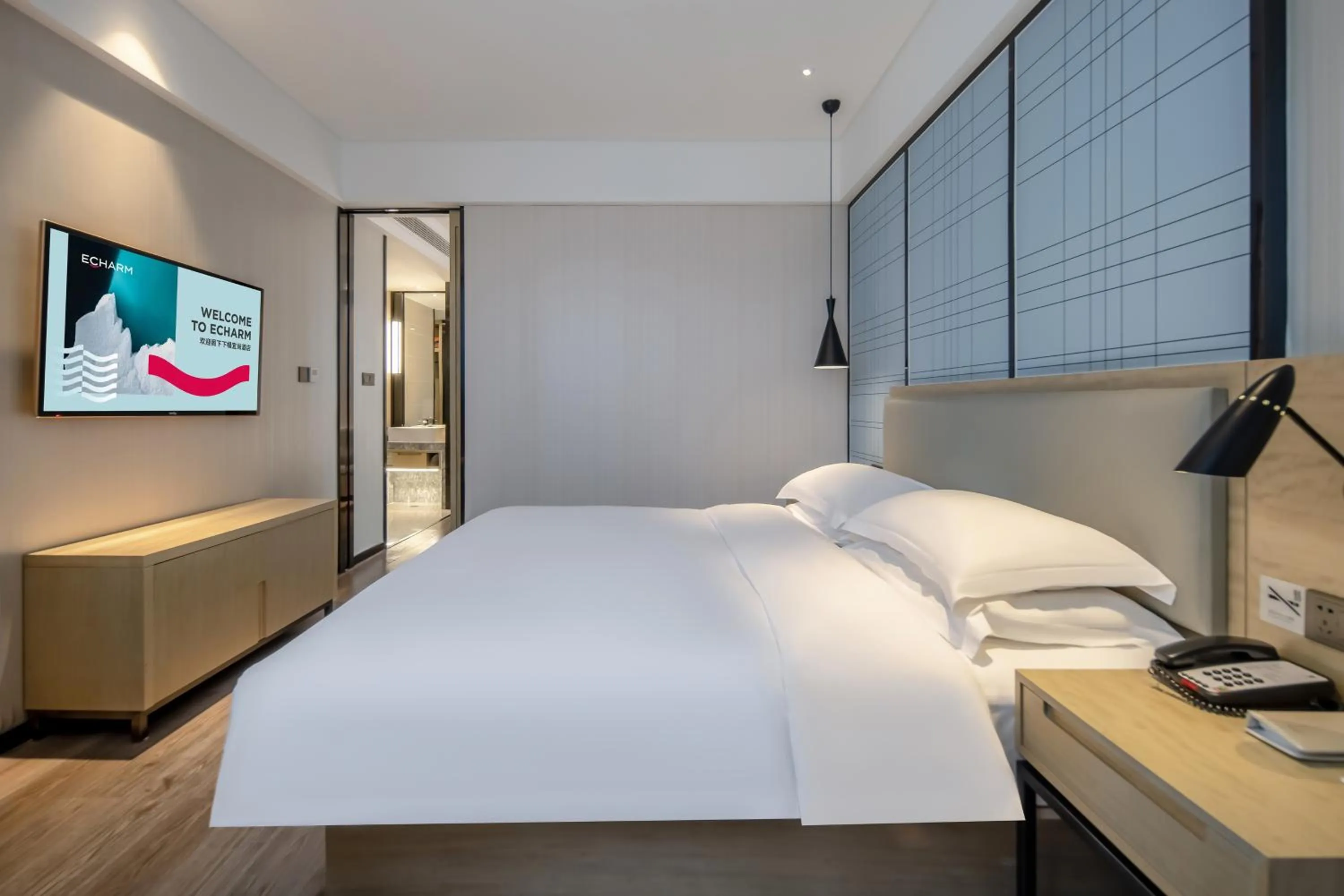 Bed in Echarm Hotel Nanning the MixC Exhibition Center Metro Station
