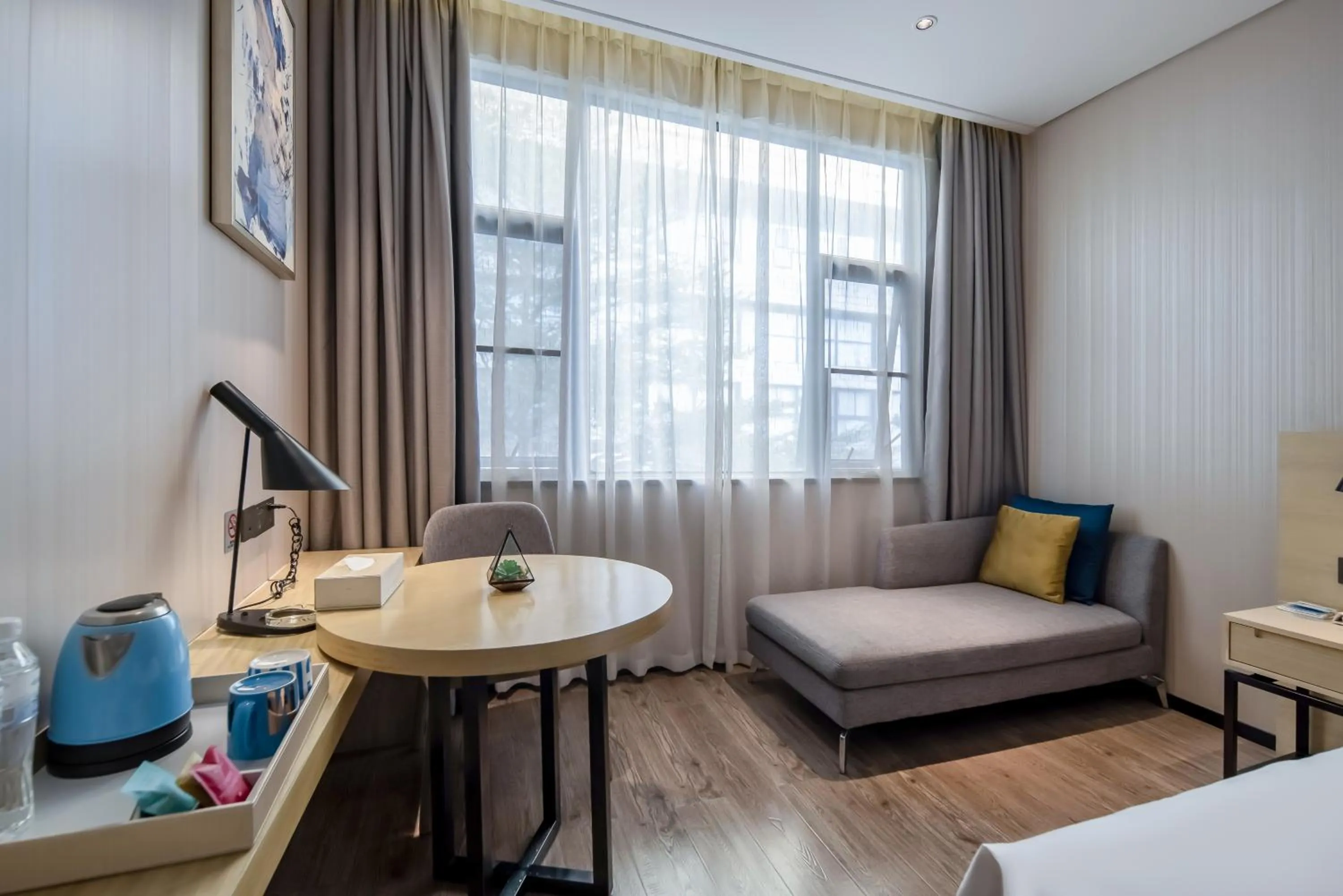 Seating area, Bed in Echarm Hotel Nanning the MixC Exhibition Center Metro Station