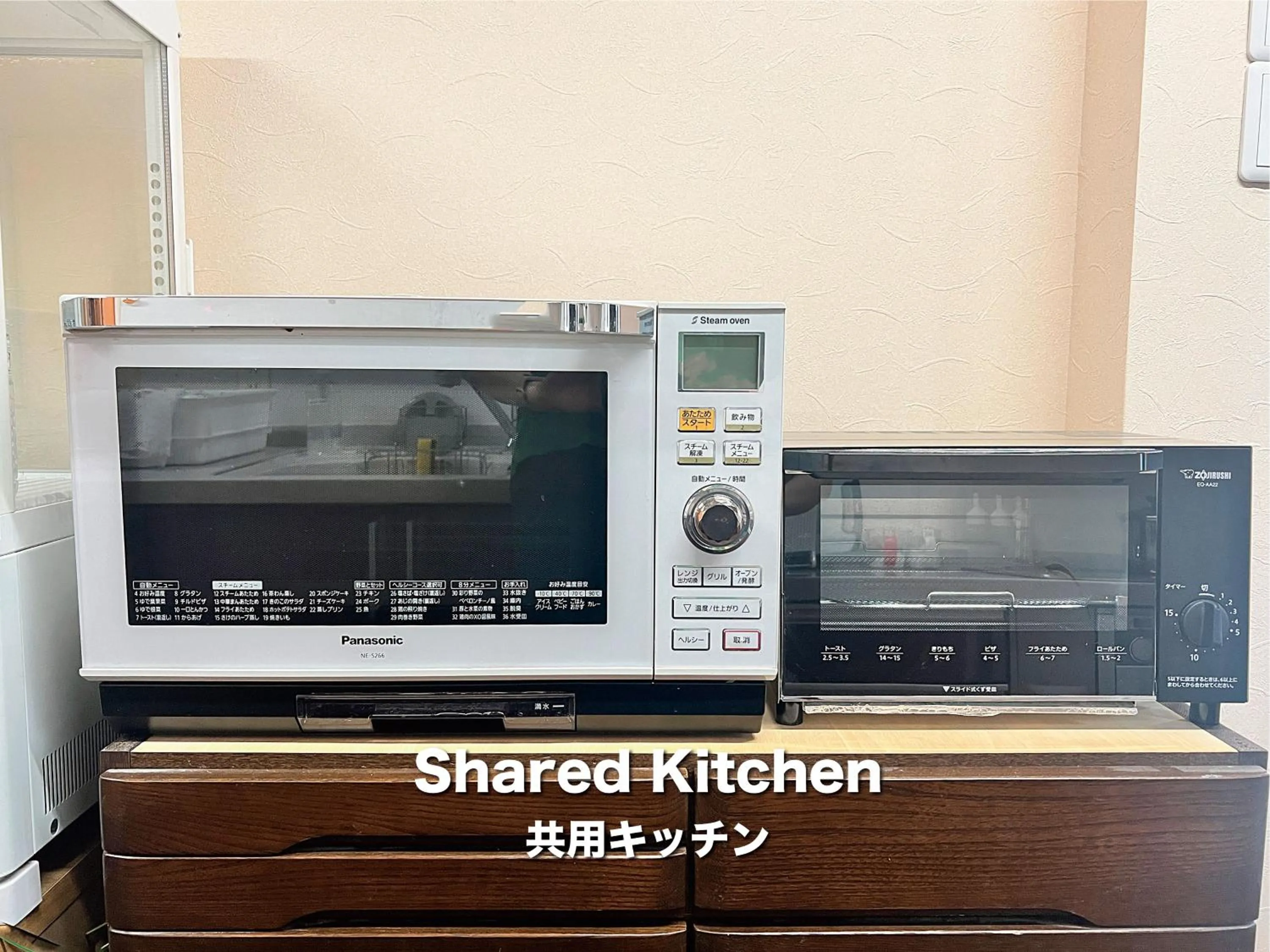 Communal kitchen in Jinya Sunset Inn by Murasaki