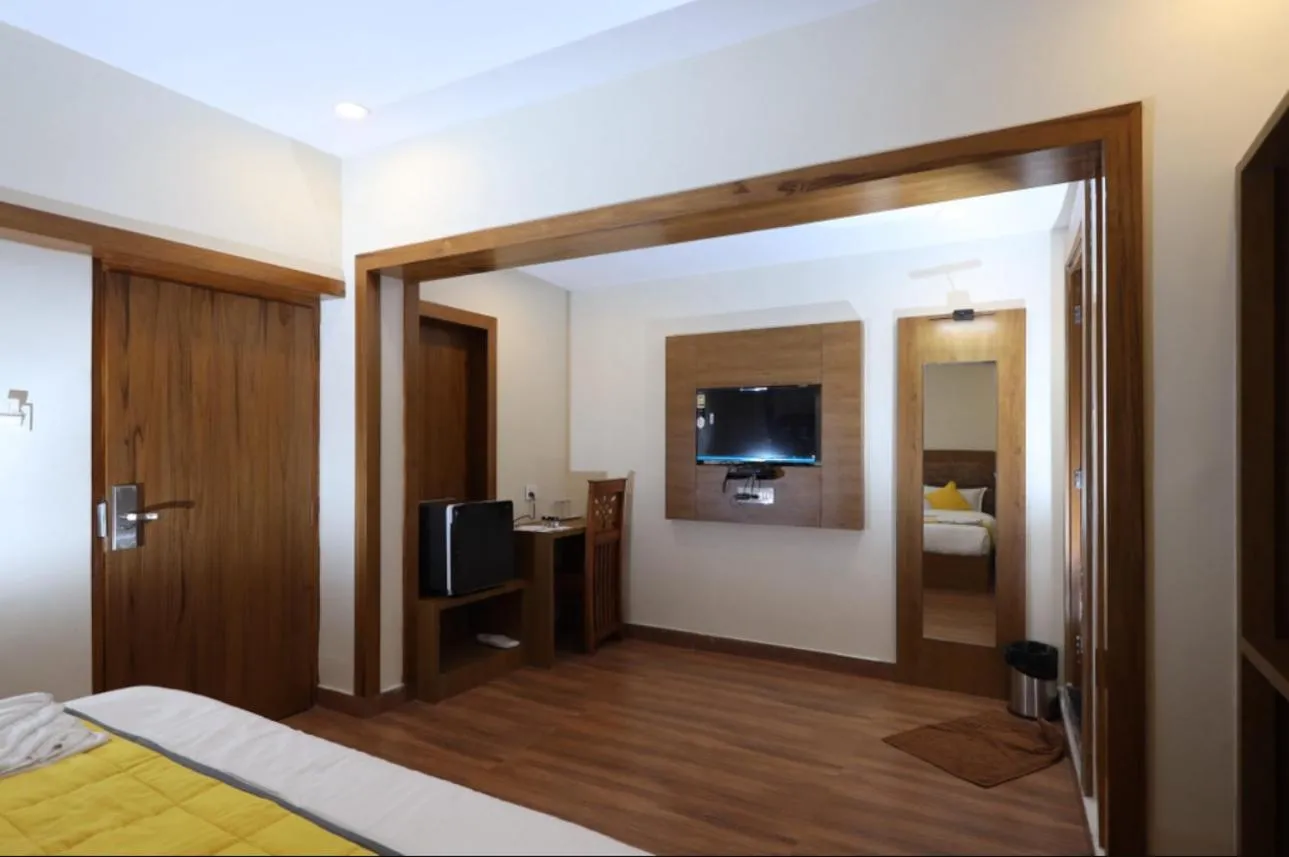 Photo of the whole room, Bed in Hotel president park Coimbatore