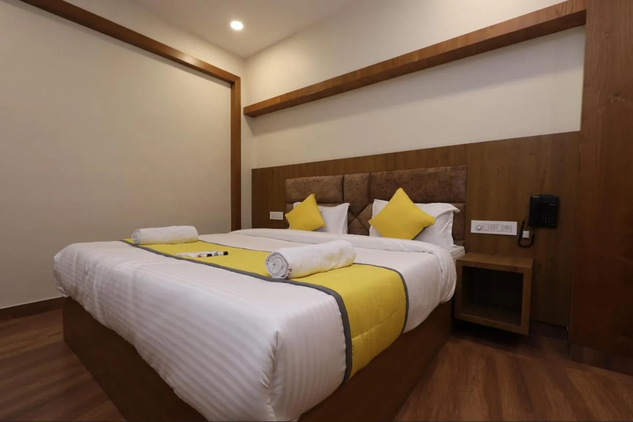 View (from property/room), Bed in Hotel president park Coimbatore