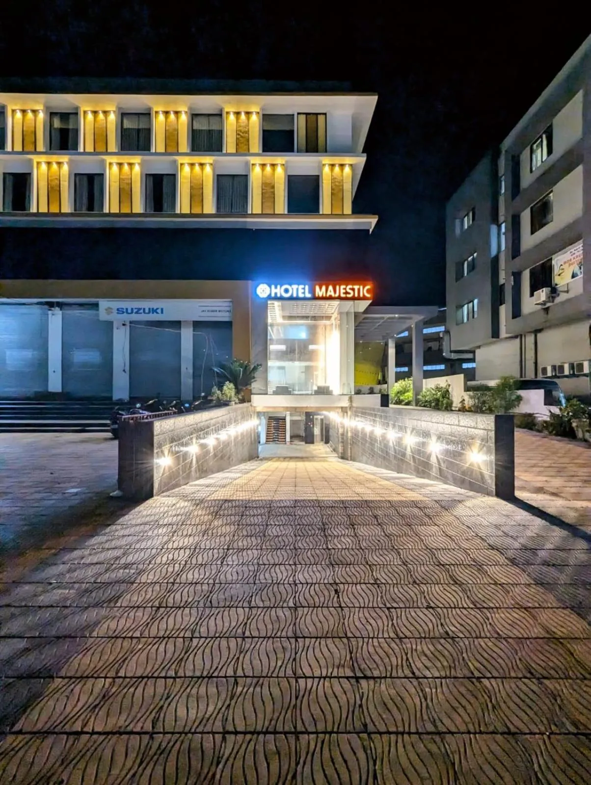 Property building in Hotel Majestic By NxtJen Hospitality