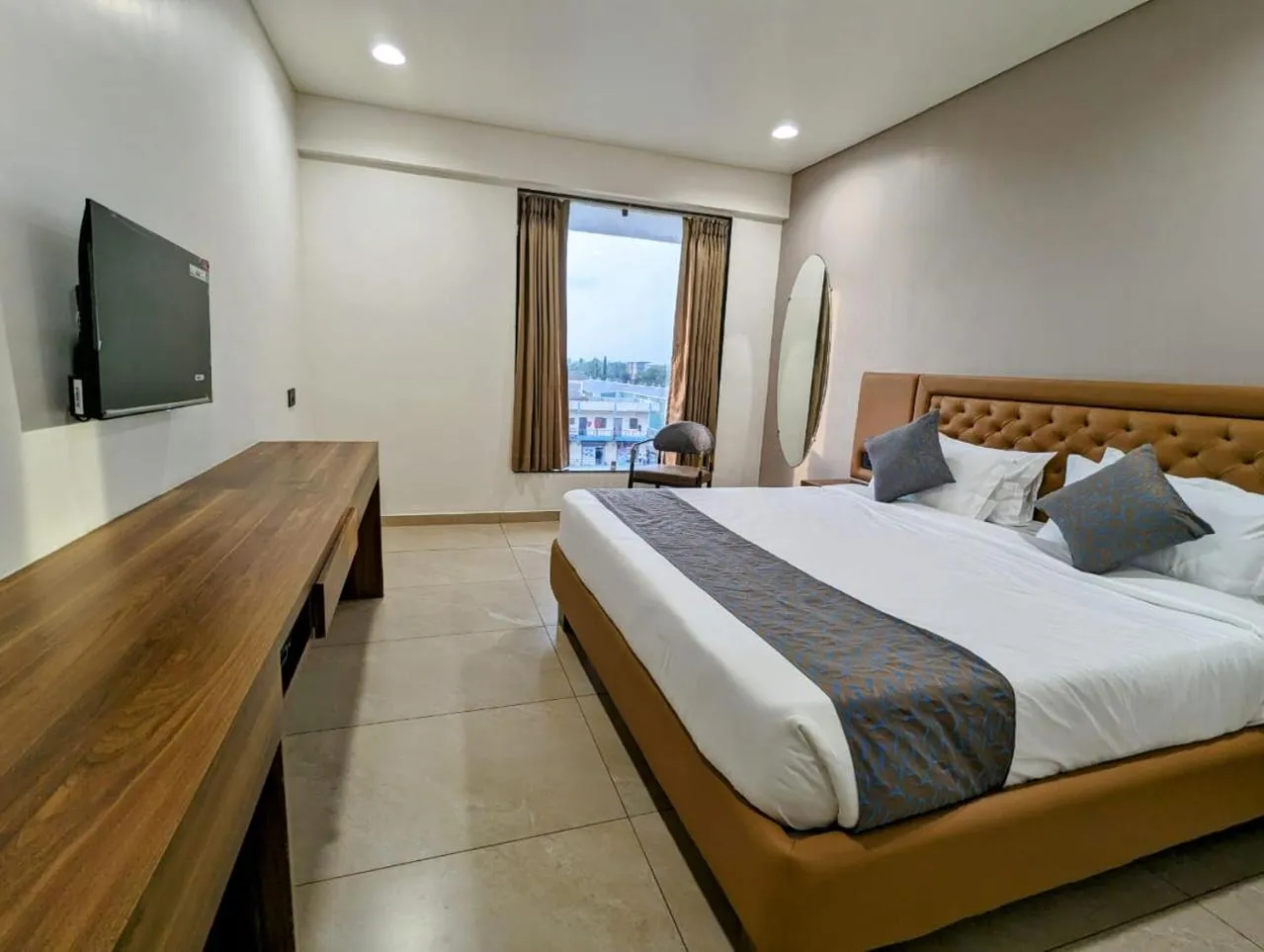 Bed in Hotel Majestic By NxtJen Hospitality