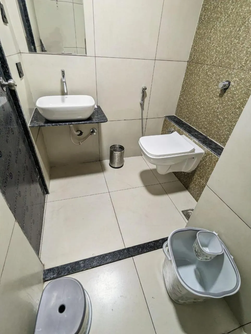 Toilet in Hotel Majestic By NxtJen Hospitality