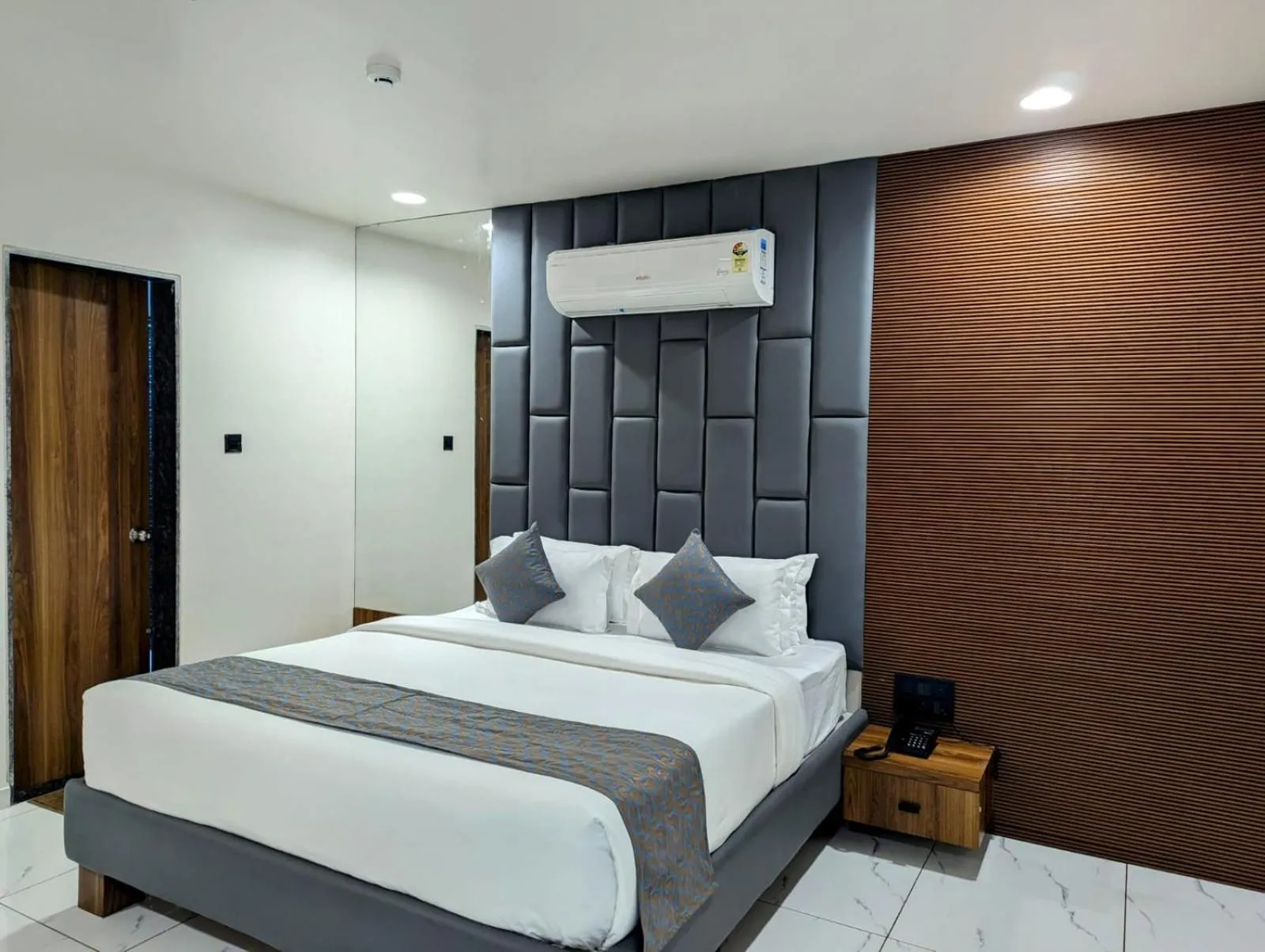 Bed in Hotel Majestic By NxtJen Hospitality