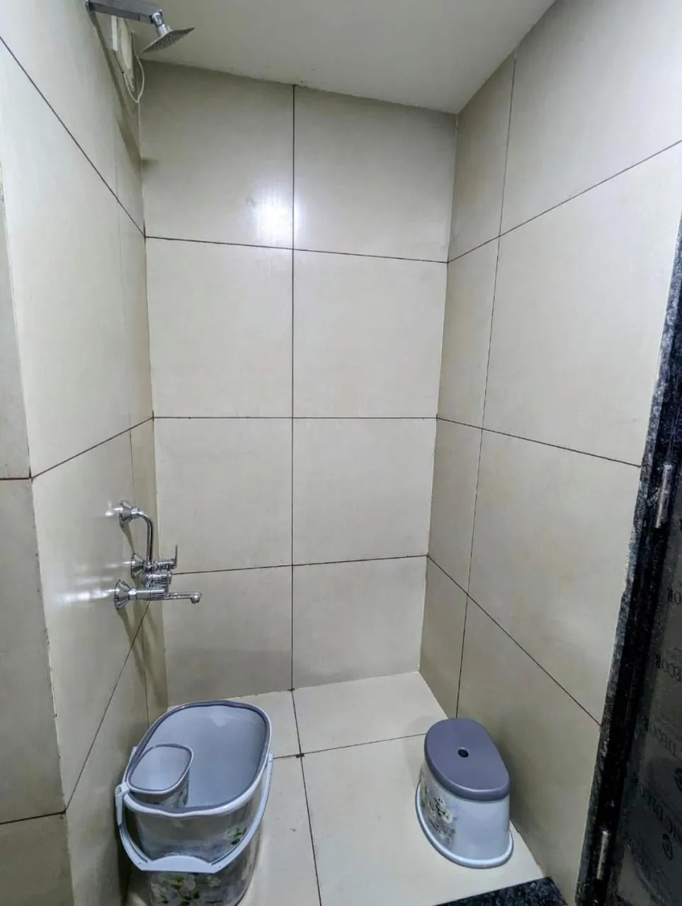 Bathroom in Hotel Majestic By NxtJen Hospitality