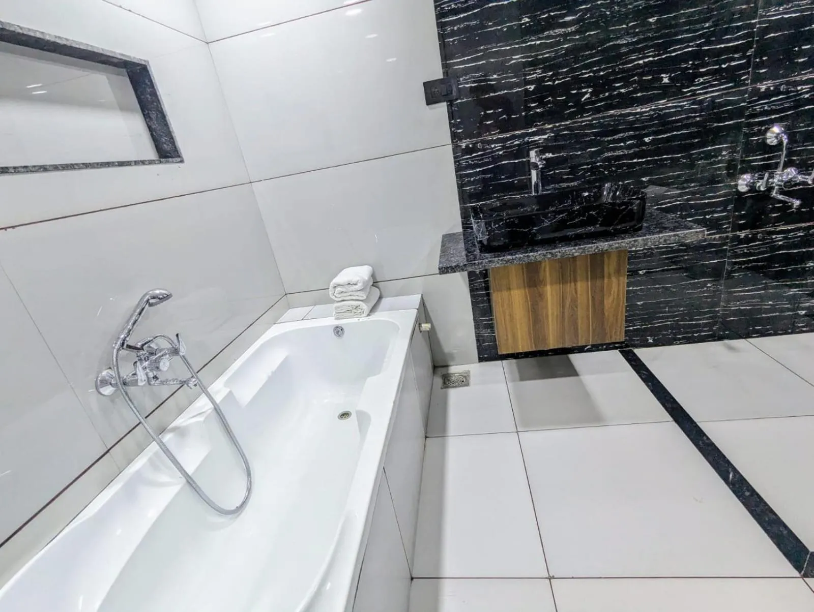 Bathroom in Hotel Majestic By NxtJen Hospitality