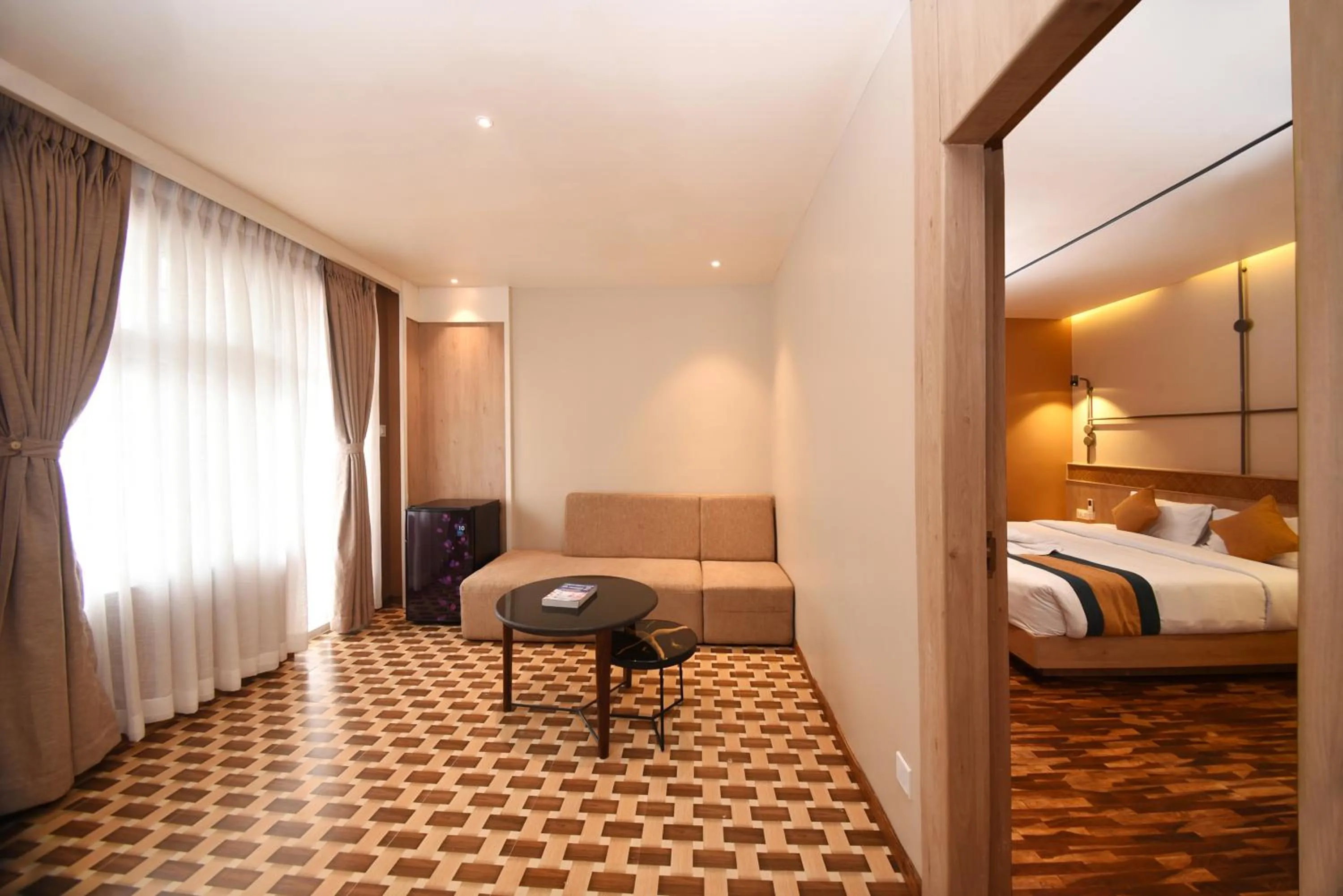 Living room, Bed in Hotel Vistara