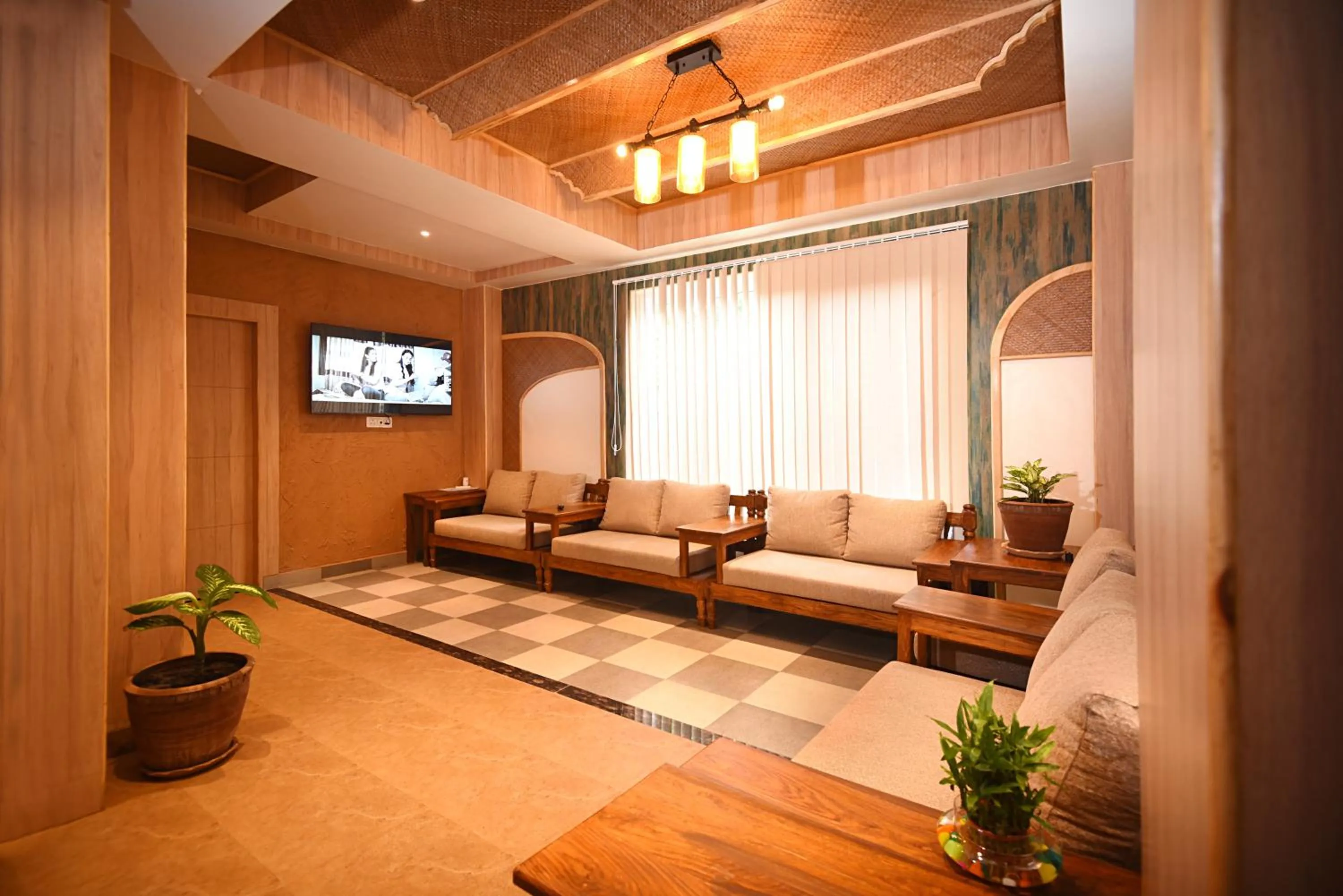 Communal lounge/ TV room in Hotel Vistara