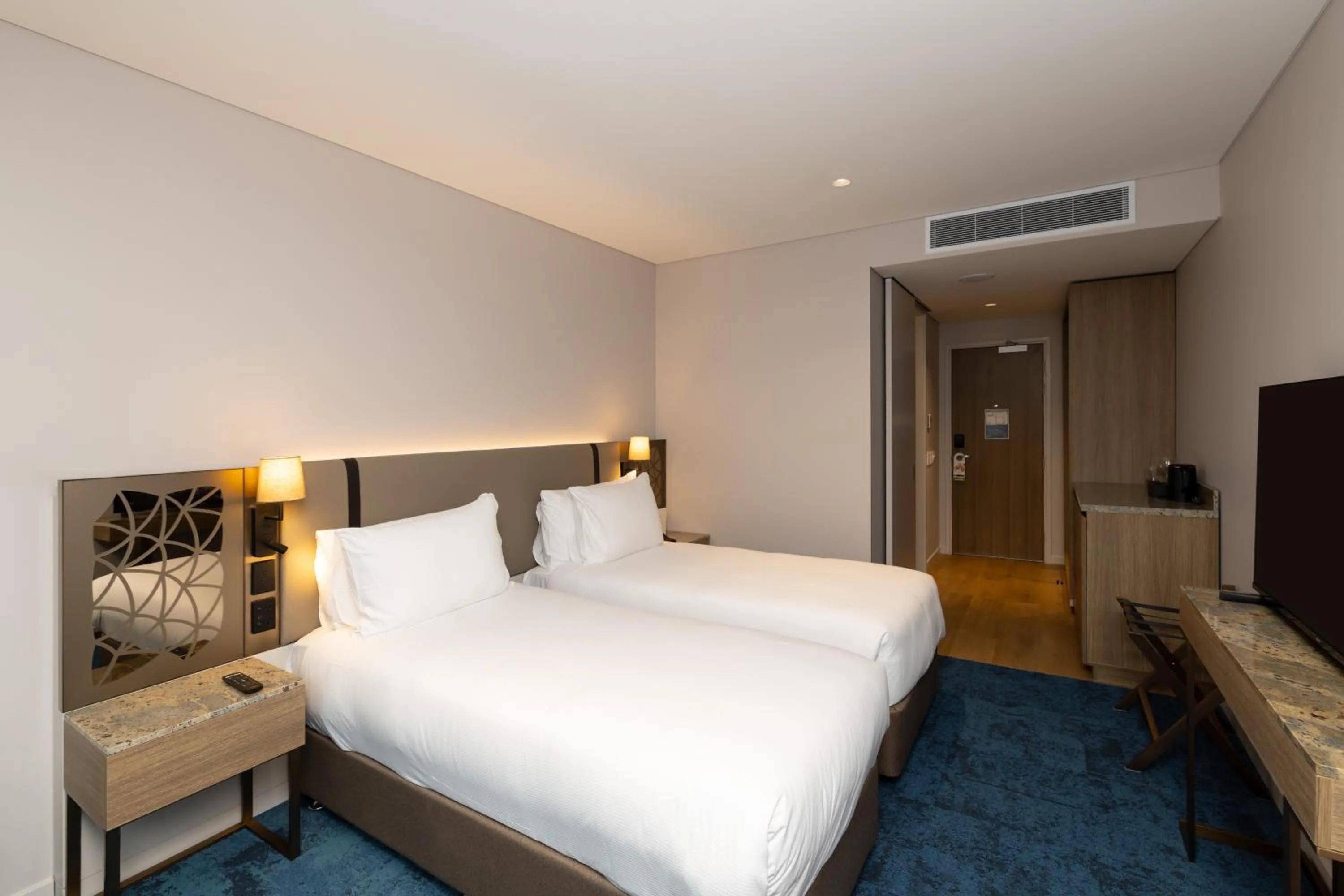 Bed in Hotel Grand Chancellor Auckland