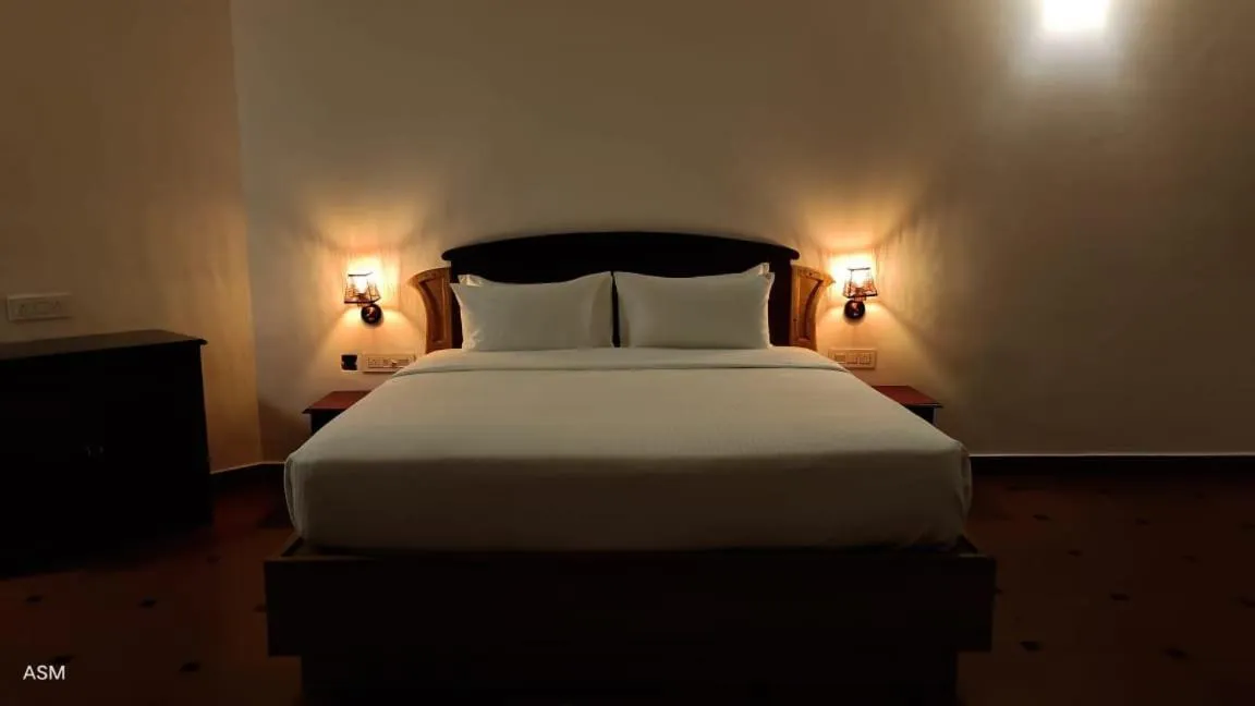 Bed in Kairali Heritage Resort