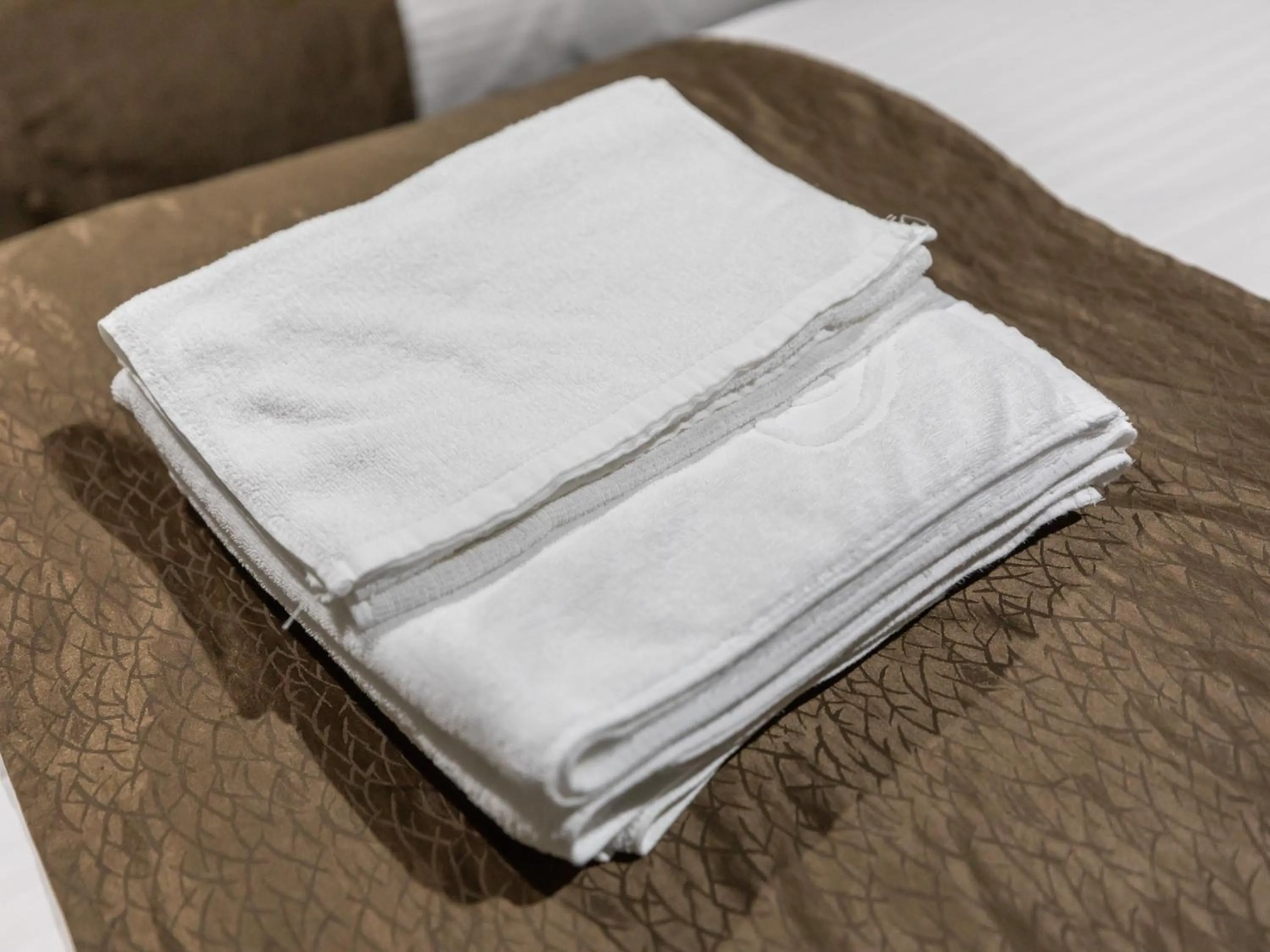 towels, Bed in Tabist Takamatsu Pearl Hotel