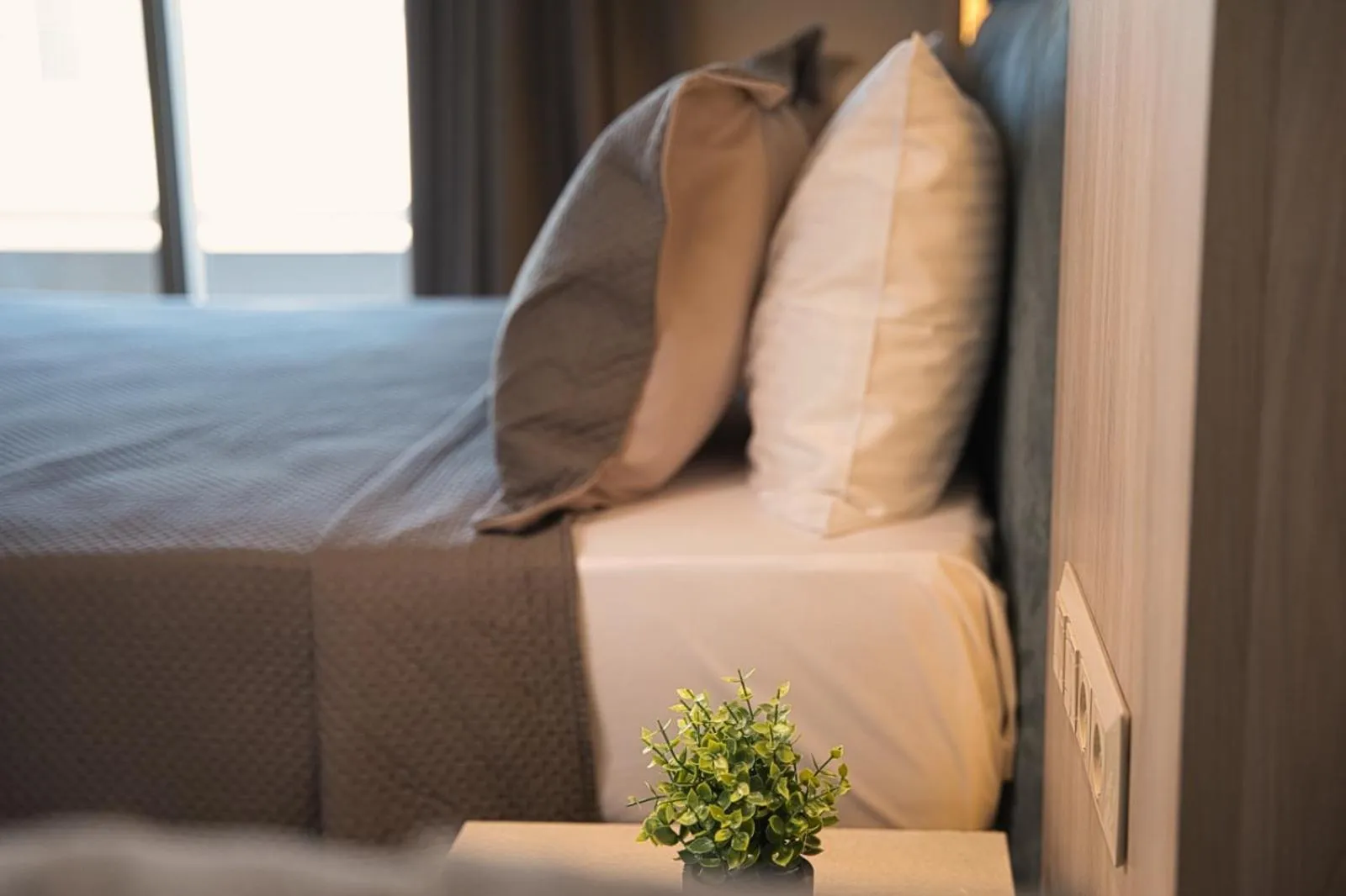 Bed in Wellnest Hotel