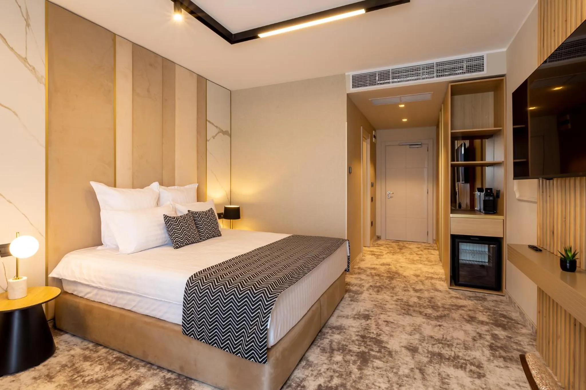 Bed in Hotel Lupa by Bueno