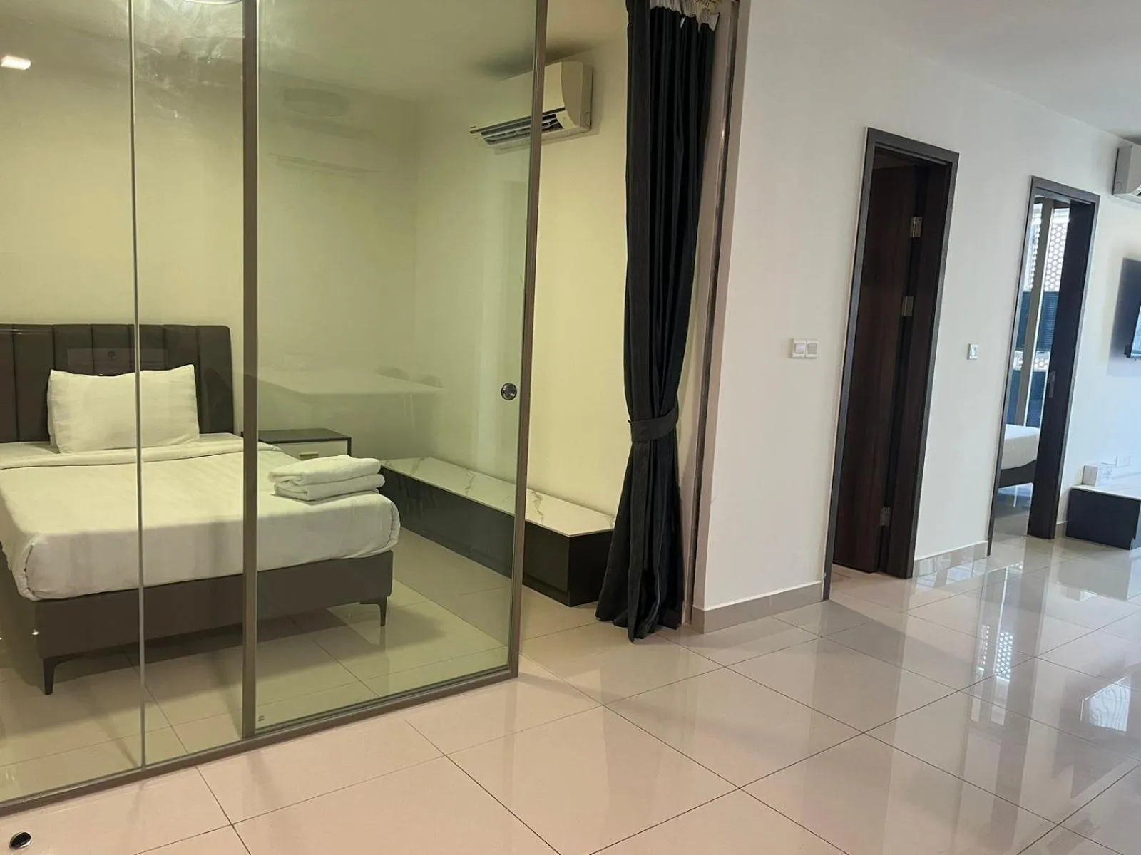 Bed in The PeAk Residence, Multi-Apartment by Emma