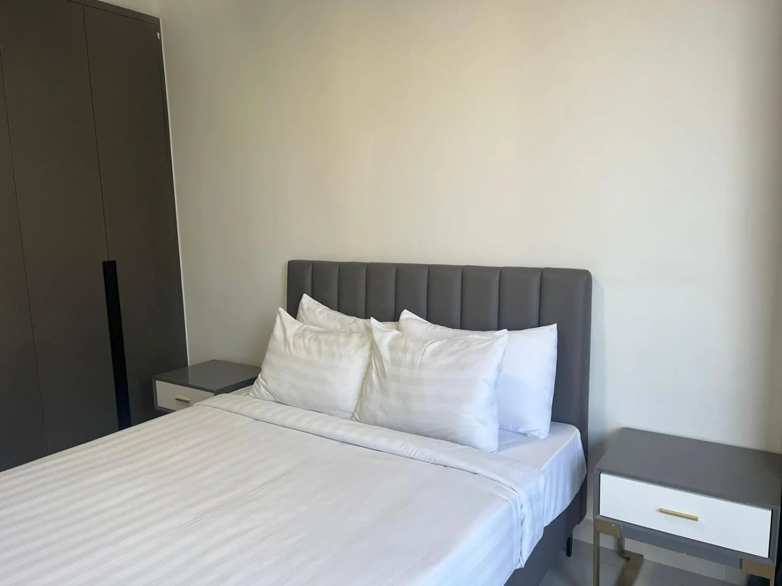 Bed in The PeAk Residence, Multi-Apartment by Emma