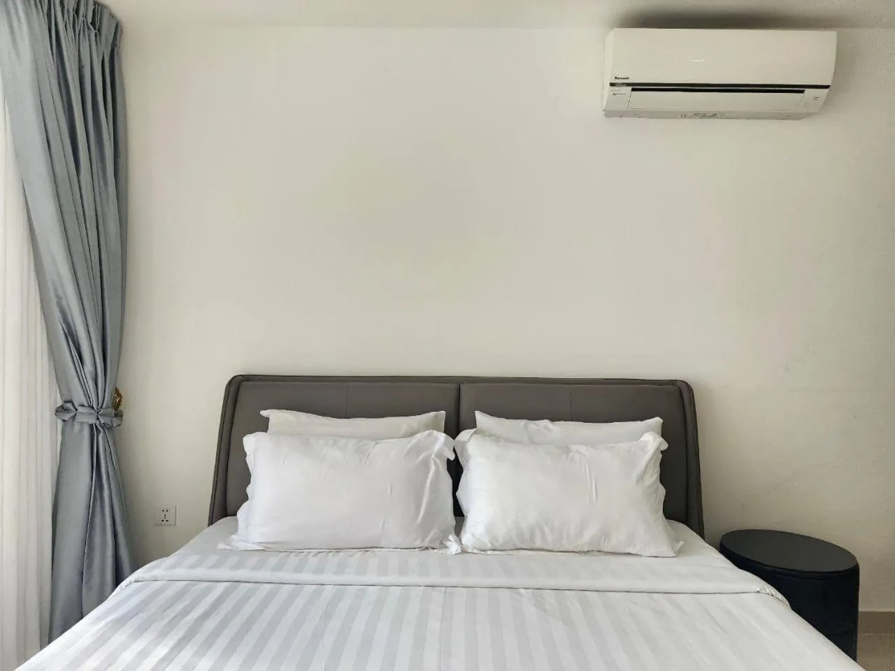 Bed in The PeAk Residence, Multi-Apartment by Emma