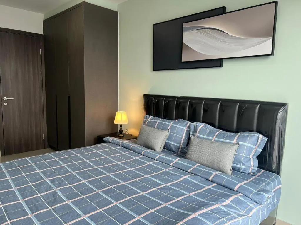 Bed in The PeAk Residence, Multi-Apartment by Emma