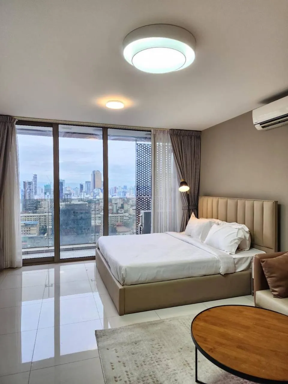 Bed in The PeAk Residence, Multi-Apartment by Emma